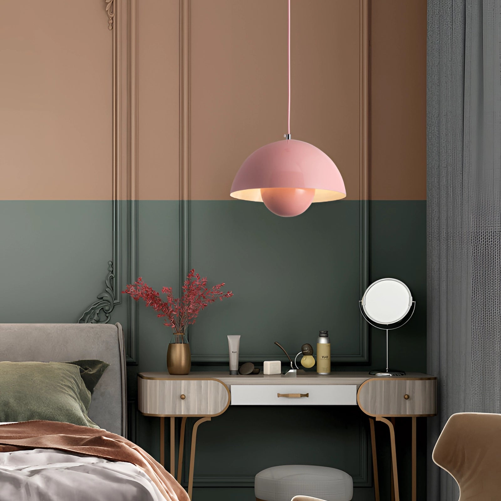 Modern retro pendant lights in yellow, white, and orange hanging above a wooden table in a stylish interior design setting.