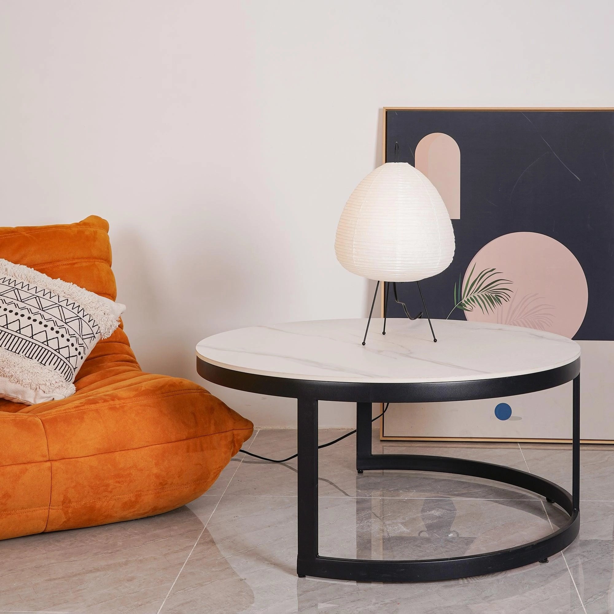 Unique Beehive Sculptural Tripod Floor Lamp in a modern interior, featuring wooden elements and sleek design, standing on a rectangular base.