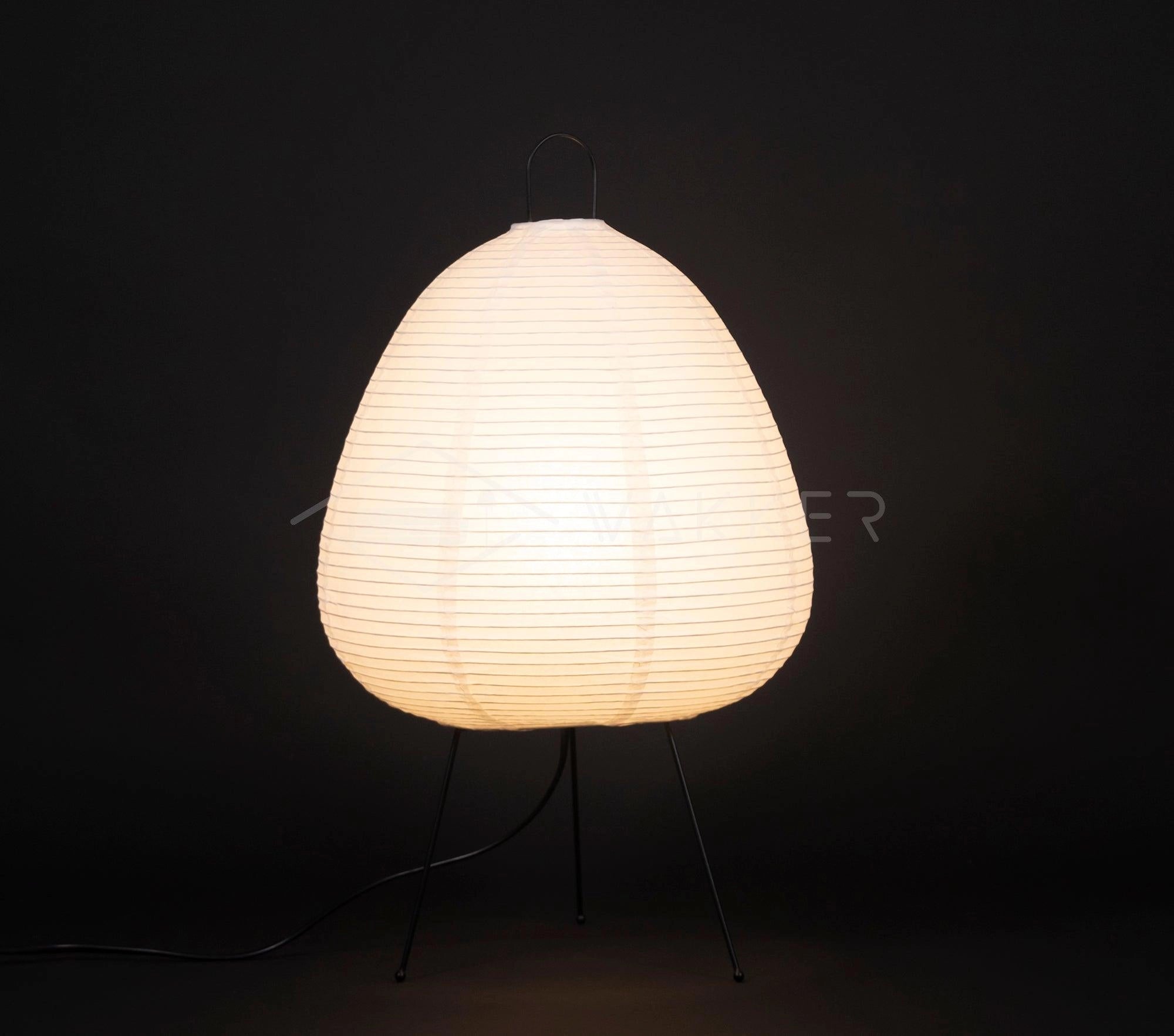 Unique Beehive Sculptural Tripod Floor Lamp with circular lampshade and elegant tripod stand, designed as a statement lighting piece.