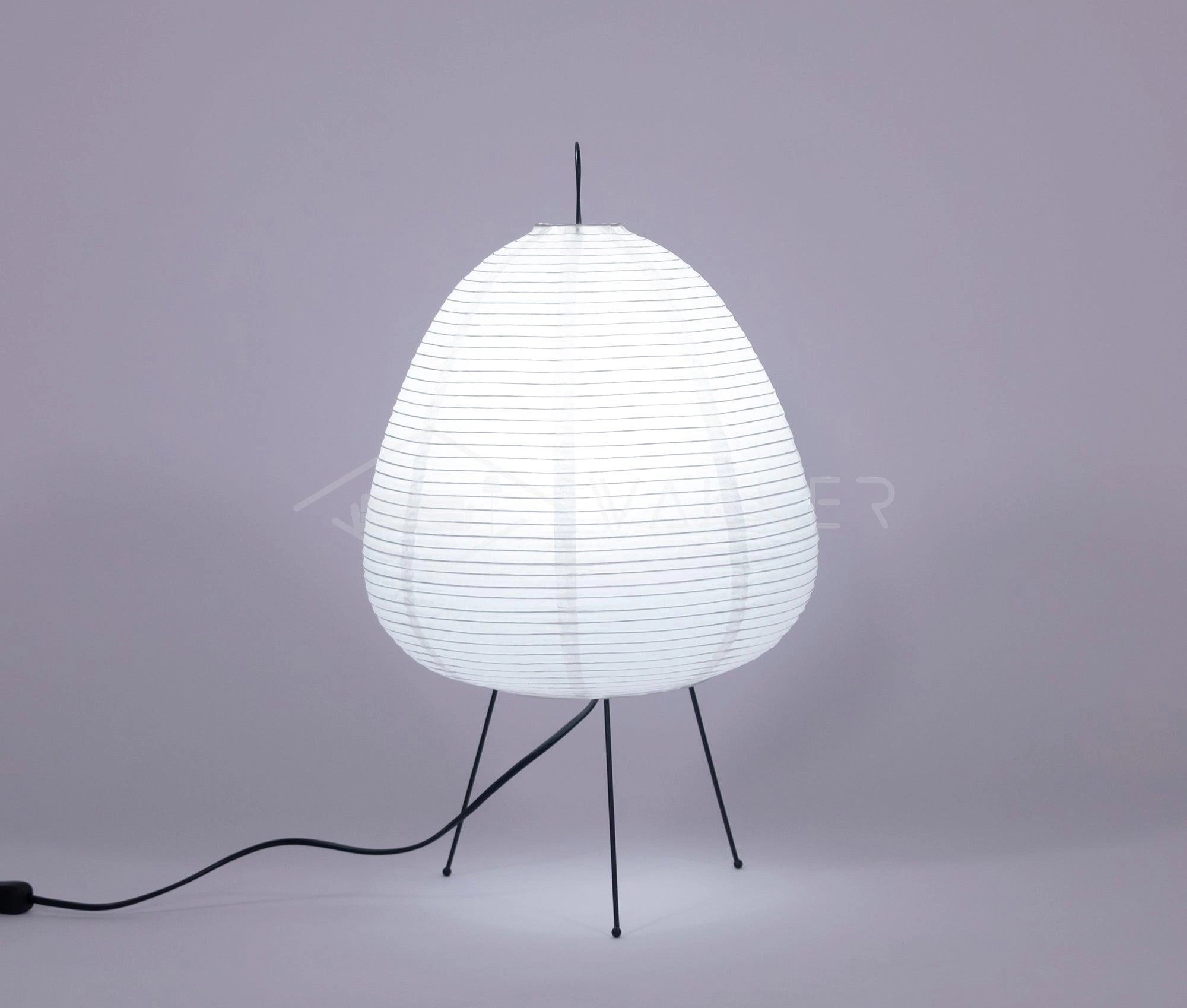 Unique Beehive Sculptural Tripod Floor Lamp with circular lampshade, serving as a statement lighting fixture in an artistically designed interior.