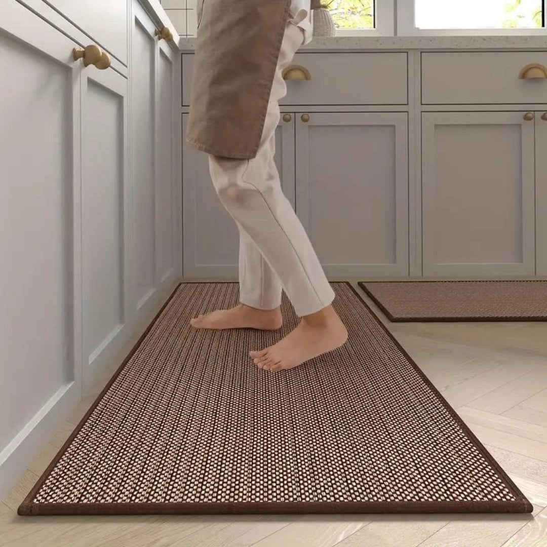 Beige non-slip anti-fatigue kitchen runner mat on a wooden floor, designed for comfort with easy-to-clean features.