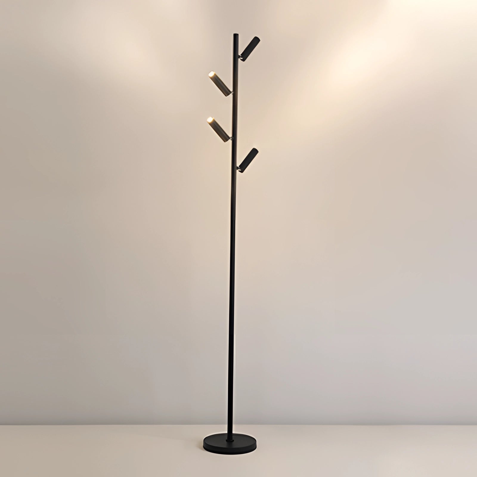 Black minimalist coat stand with a modern sleek design, featuring a warm light accent. Freestanding rack style suitable for entryways or living spaces, captured in a still life setup.