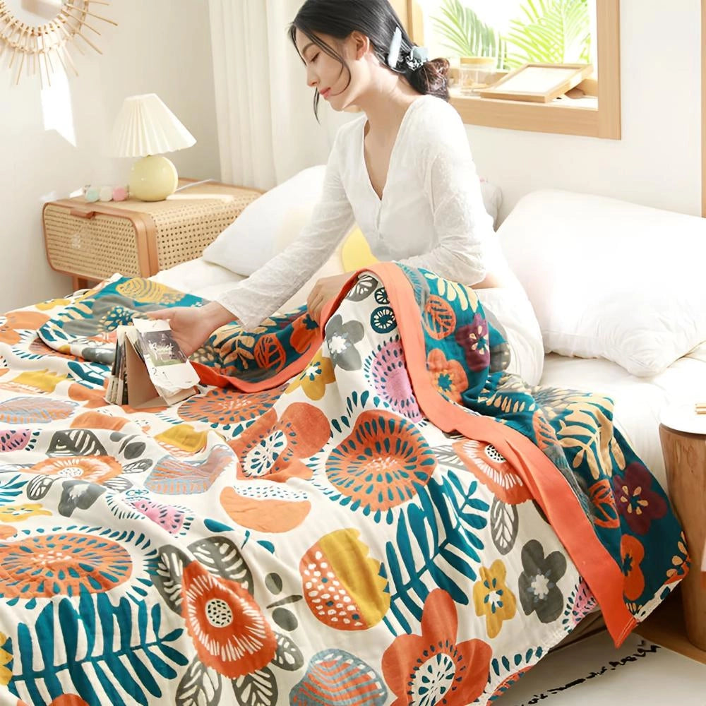 Bohemian Floral Comforter Set in queen size featuring an ethnic print design on a bed, surrounded by a cozy and stylish interior with a couch, lamp, and picture frame.