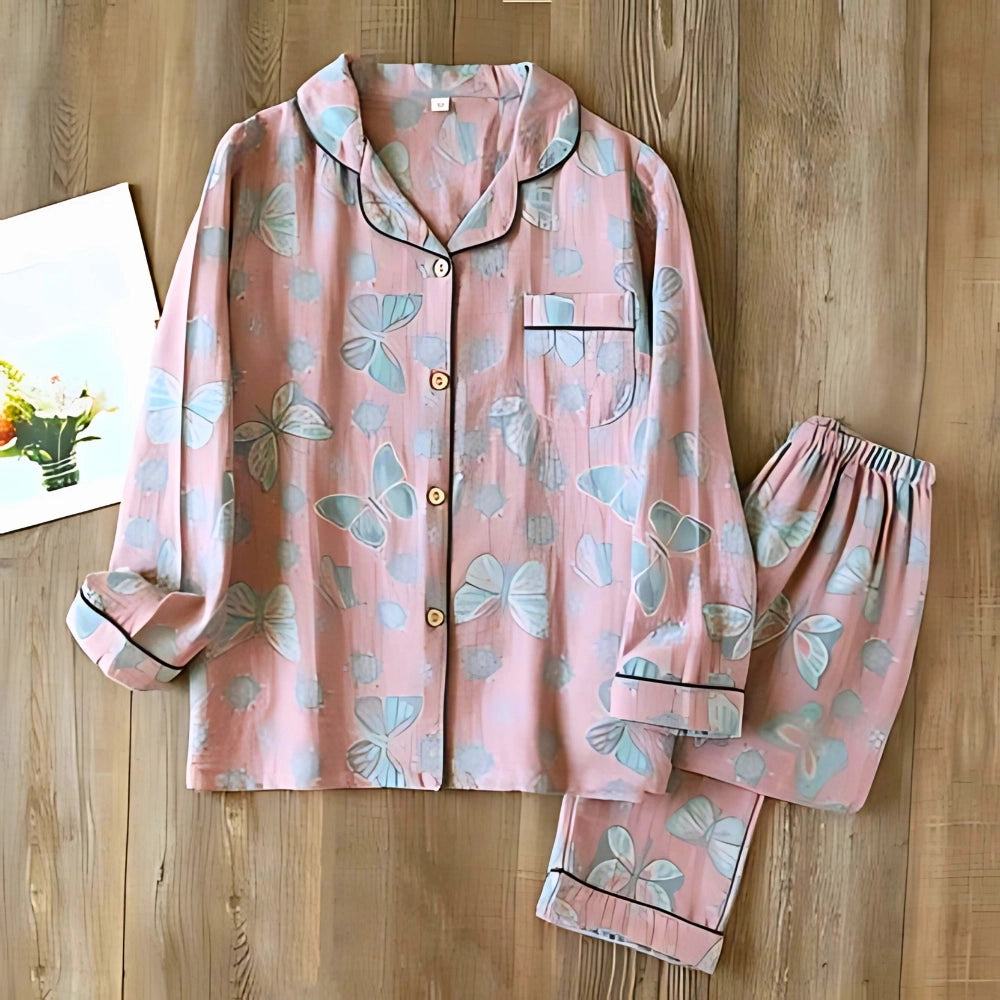 Turquoise paisley summer trousers for women, designed with a bohemian floral print, shown in pink color, size XL.
