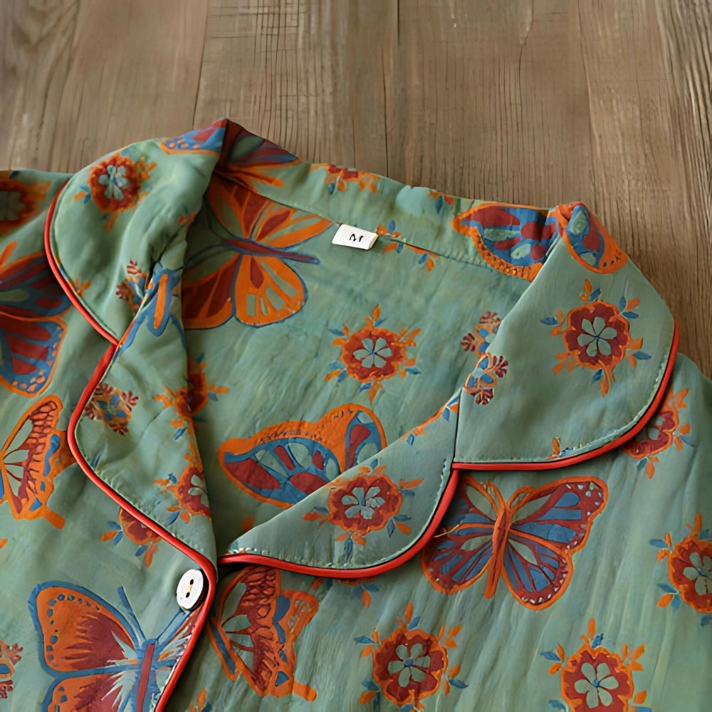 Bohemian floral print women's pants in a turquoise paisley design, featuring a vibrant pattern and relaxed fit, available in XL size with a green hue.