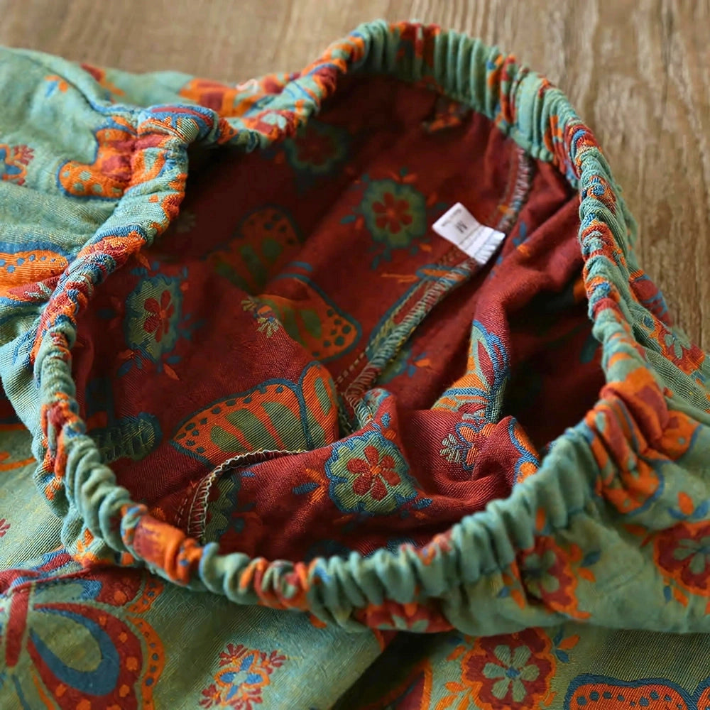 Bohemian floral print women's pants featuring a vibrant turquoise paisley design, perfect for summer wear.