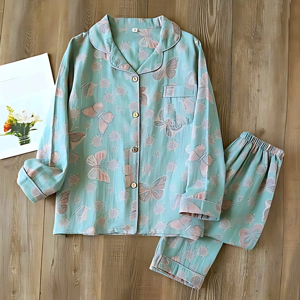 Bohemian turquoise paisley print women's pants in a summer style, displayed on a hanger against a neutral background.