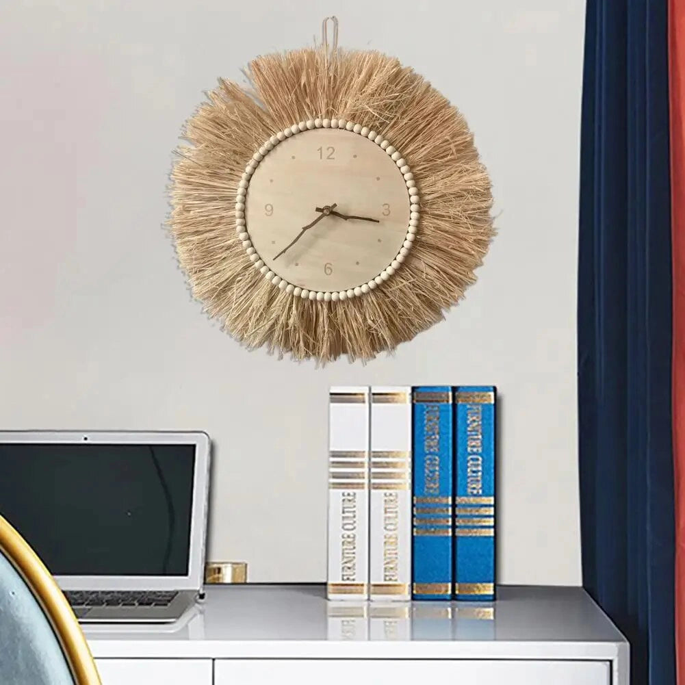 Handcrafted boho tassel wall clock with a wooden face and fringe design, displayed on a shelf as part of a home decor setup.