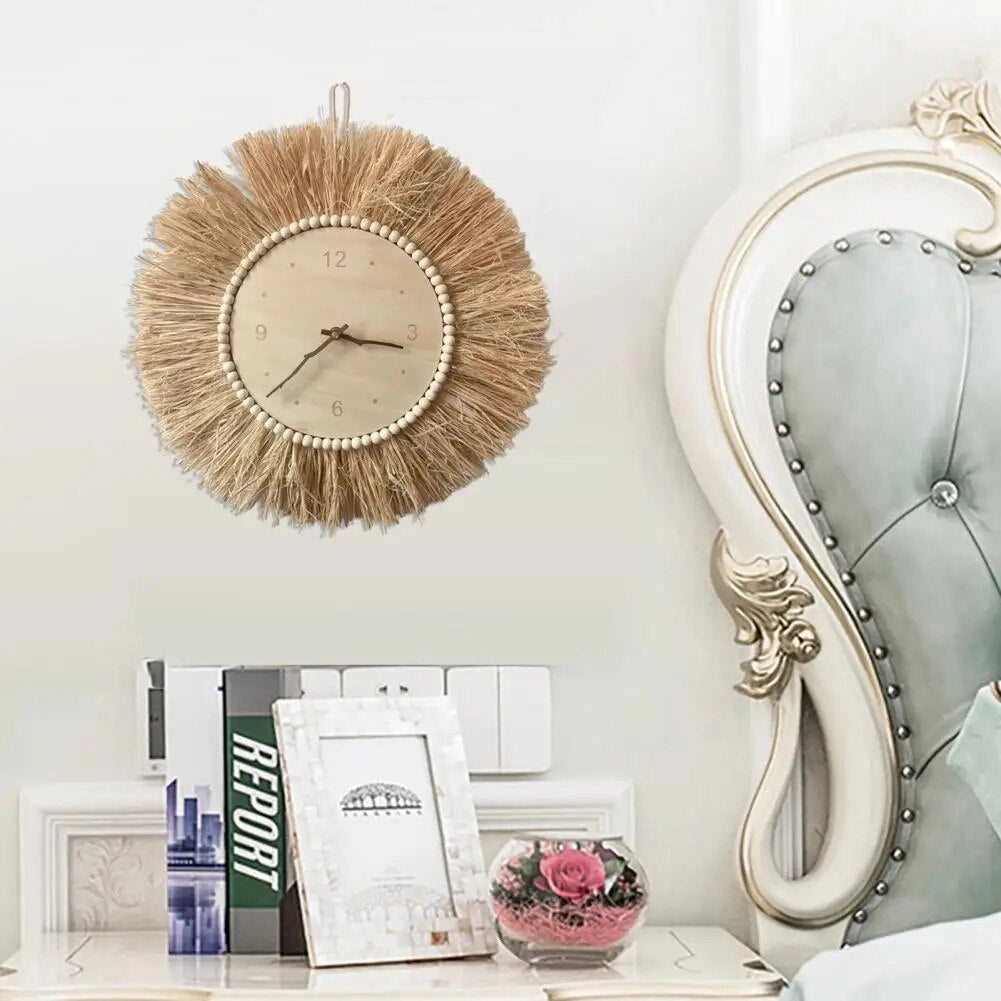 
A handcrafted Boho Tassel Wall Clock featuring a stylish fringe design, mounted on a wall above a wooden shelf in a modern interior setting.
