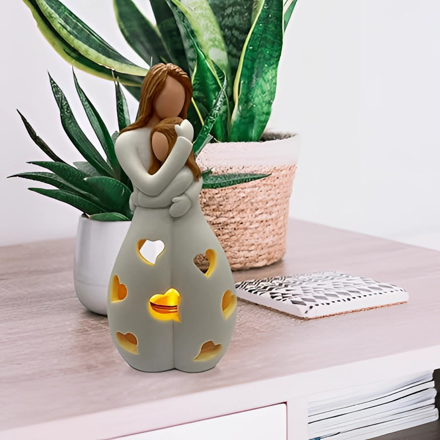 Ceramic Love Lamp with heart pattern on a desk next to a small potted plant, creating a romantic and cozy ambiance.
