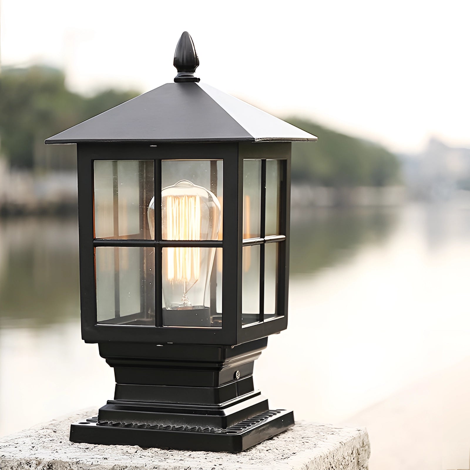 Classic vintage-style metal lantern with weather-resistant features, showcasing a rustic design with glass panels and a sturdy metal frame, emitting a warm glow suitable for outdoor environments.