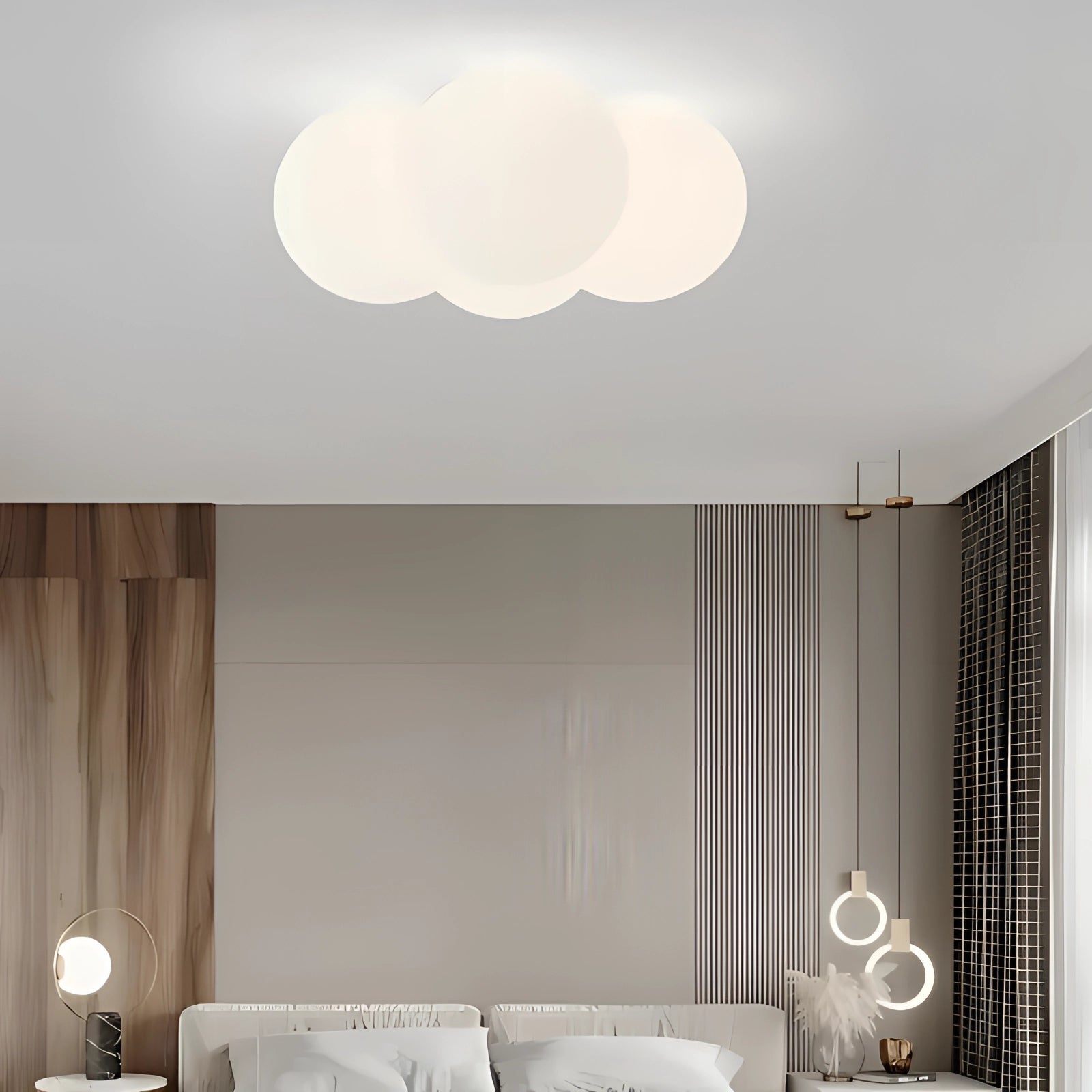 Cloud-shaped LED ceiling light illuminating a modern minimalist living room with a comfortable white couch, wood accents, and stylish interior design elements.