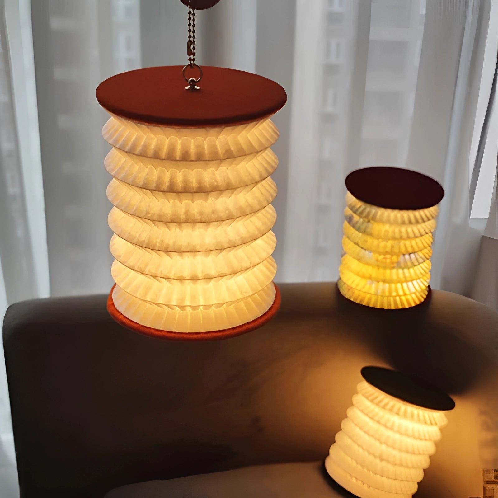 Collapsible wood grain LED table lamp with a modern design, featuring a rectangular shape and an orange-yellow hue, showcasing a natural wood finish and wood stain texture.
