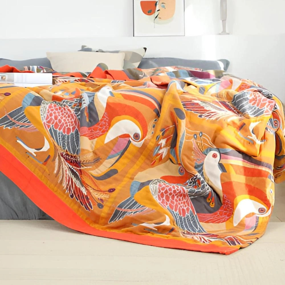 A colorful bird duvet cover featuring an artistic wildlife design with vibrant orange and artistic patterns, perfect for adding a touch of nature-inspired decor to your bedroom.