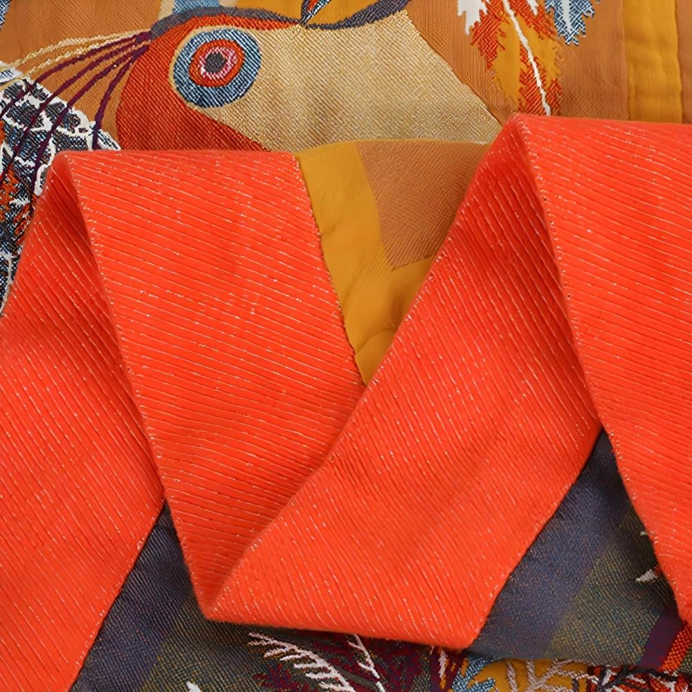 Colorful bird duvet cover featuring a vibrant pattern with shades of orange and electric blue, resembling artistic wildlife decor.