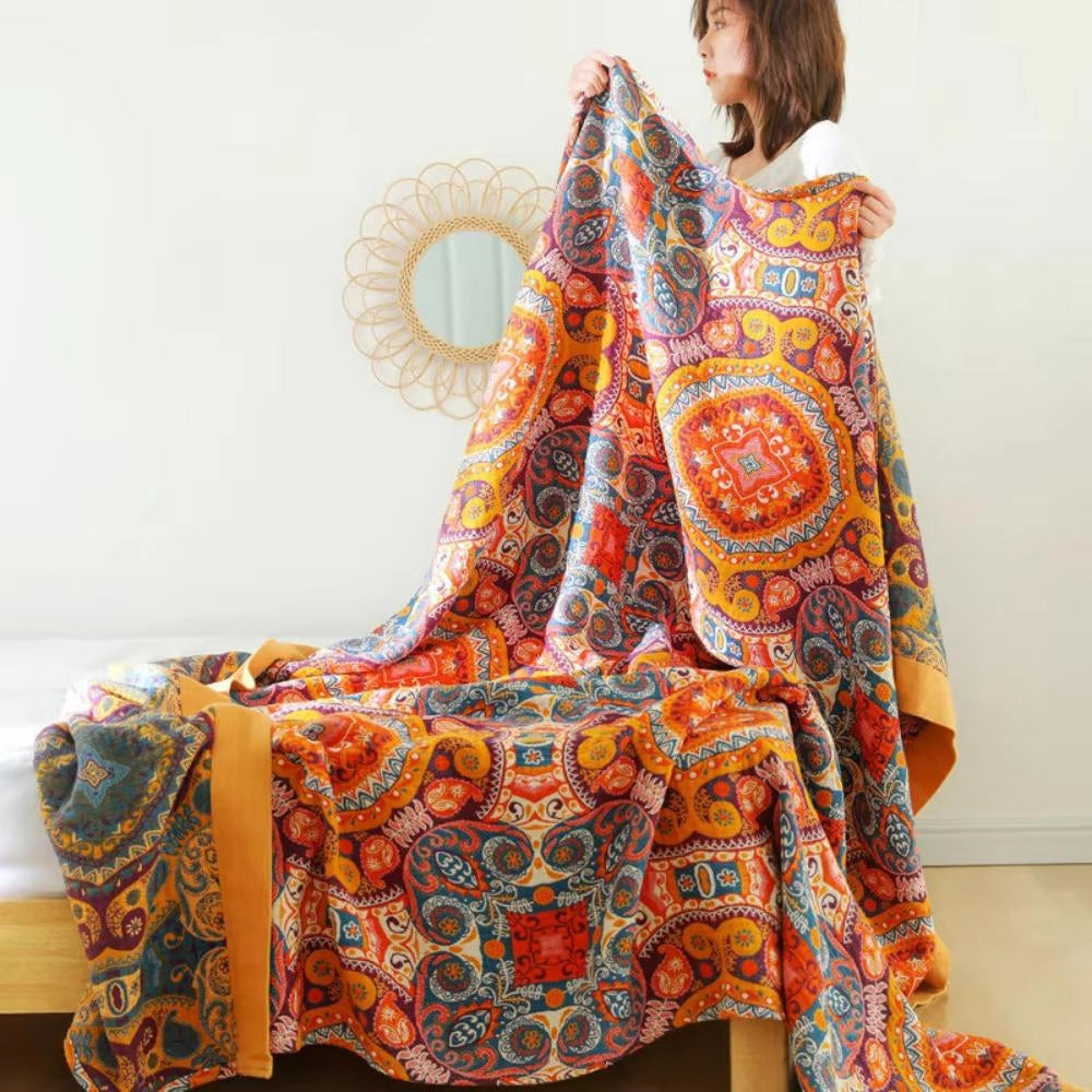 A colorful boho paisley quilt featuring a luxurious vintage patchwork design with intricate motifs and patterns.