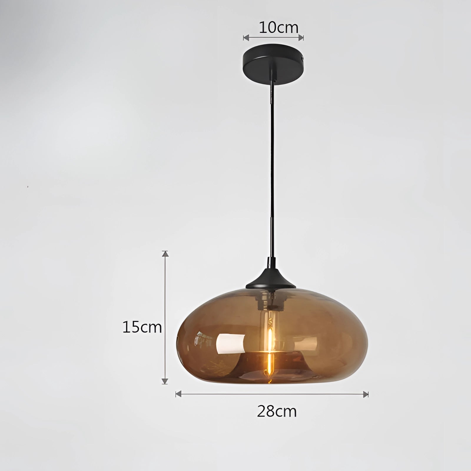 Colorful glass pendant light with a mid-century modern design, featuring a coffee-colored finish and emitting a warm white glow, hanging from a ceiling fixture.