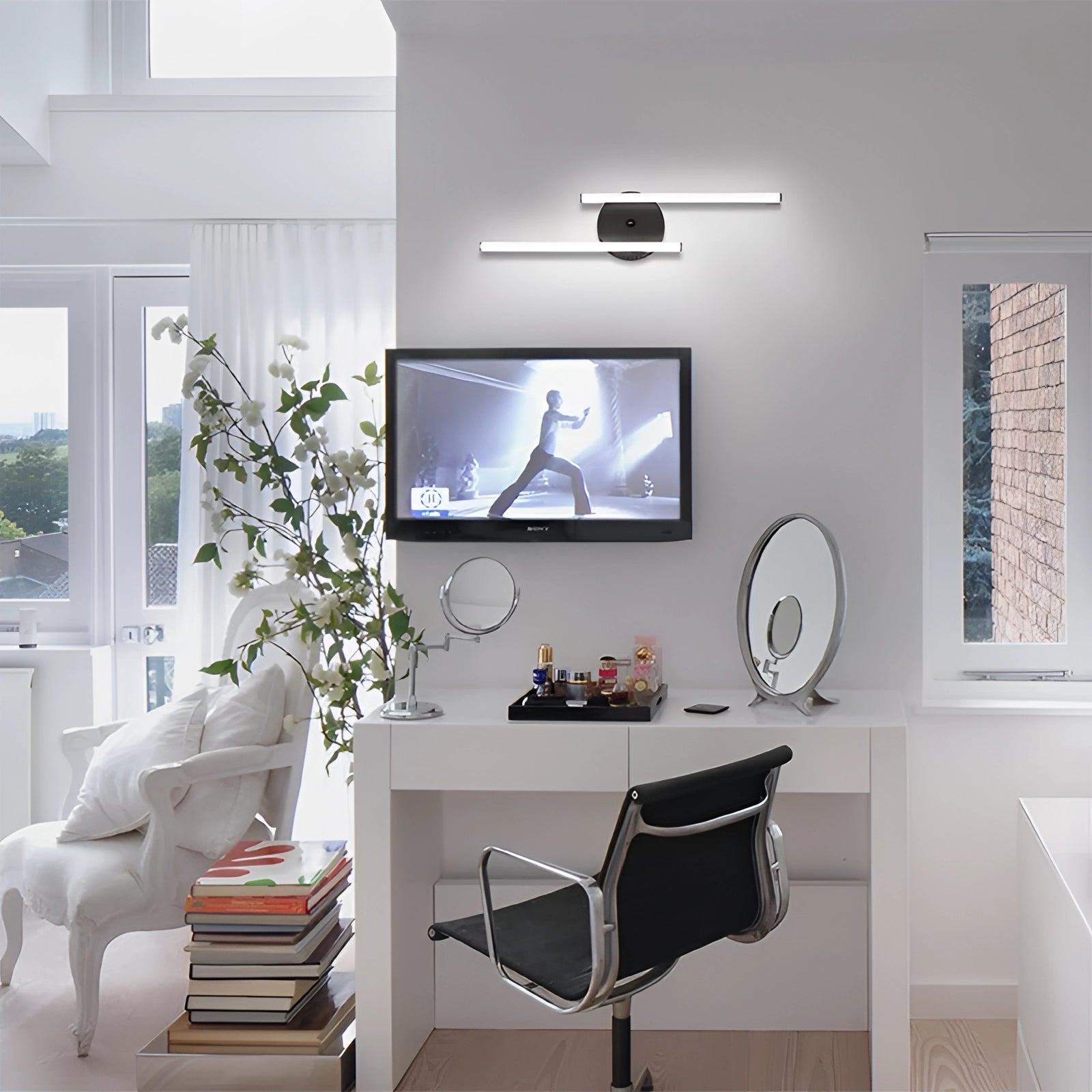 Modern minimalist dual-arm adjustable LED wall sconce in a contemporary interior setting with neutral tones and sleek design elements.