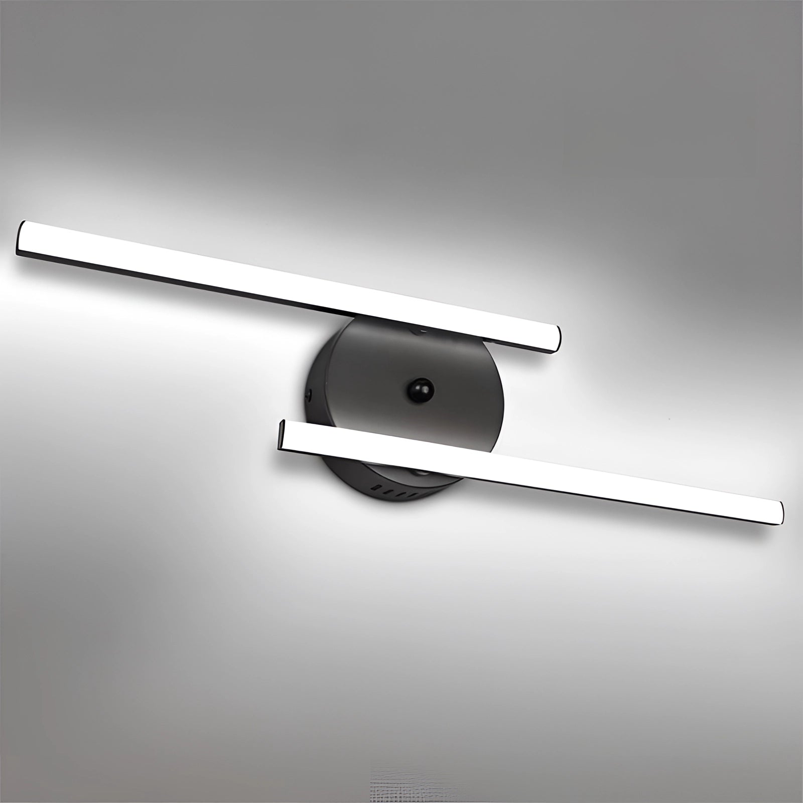 Modern minimalist dual-arm LED wall sconce with an adjustable design, featuring sleek metal construction and a contemporary look.