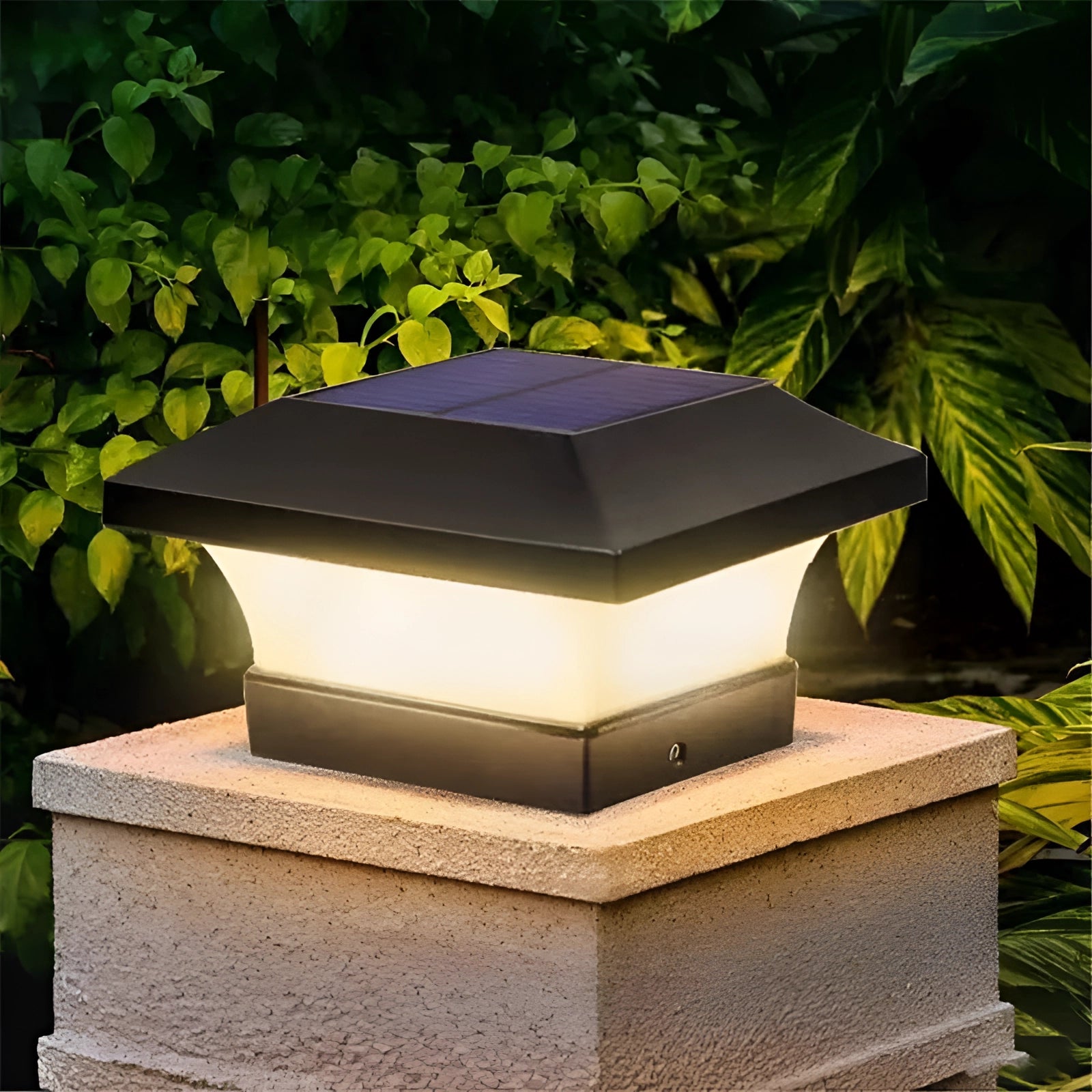 Eco-friendly LED solar post cap light installed on a wooden post in a garden setting with surrounding plants and grass, providing ambient lighting from dusk to dawn.