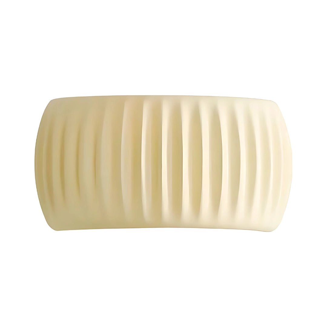 Eco-friendly textured foam roller in white designed for muscle recovery therapy, showcasing its rectangular shape and textured surface made from synthetic rubber and composite materials.