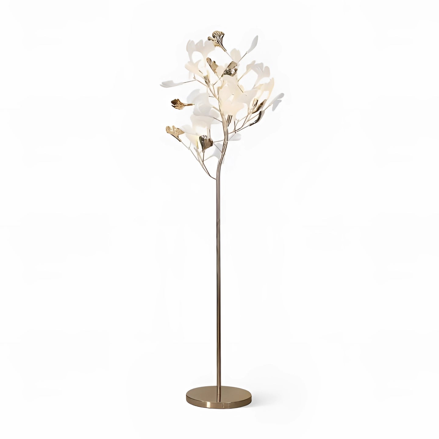 Elegant gold floor lamp shaped like a gingko leaf with nature-inspired brass detailing, standing on a sleek base.