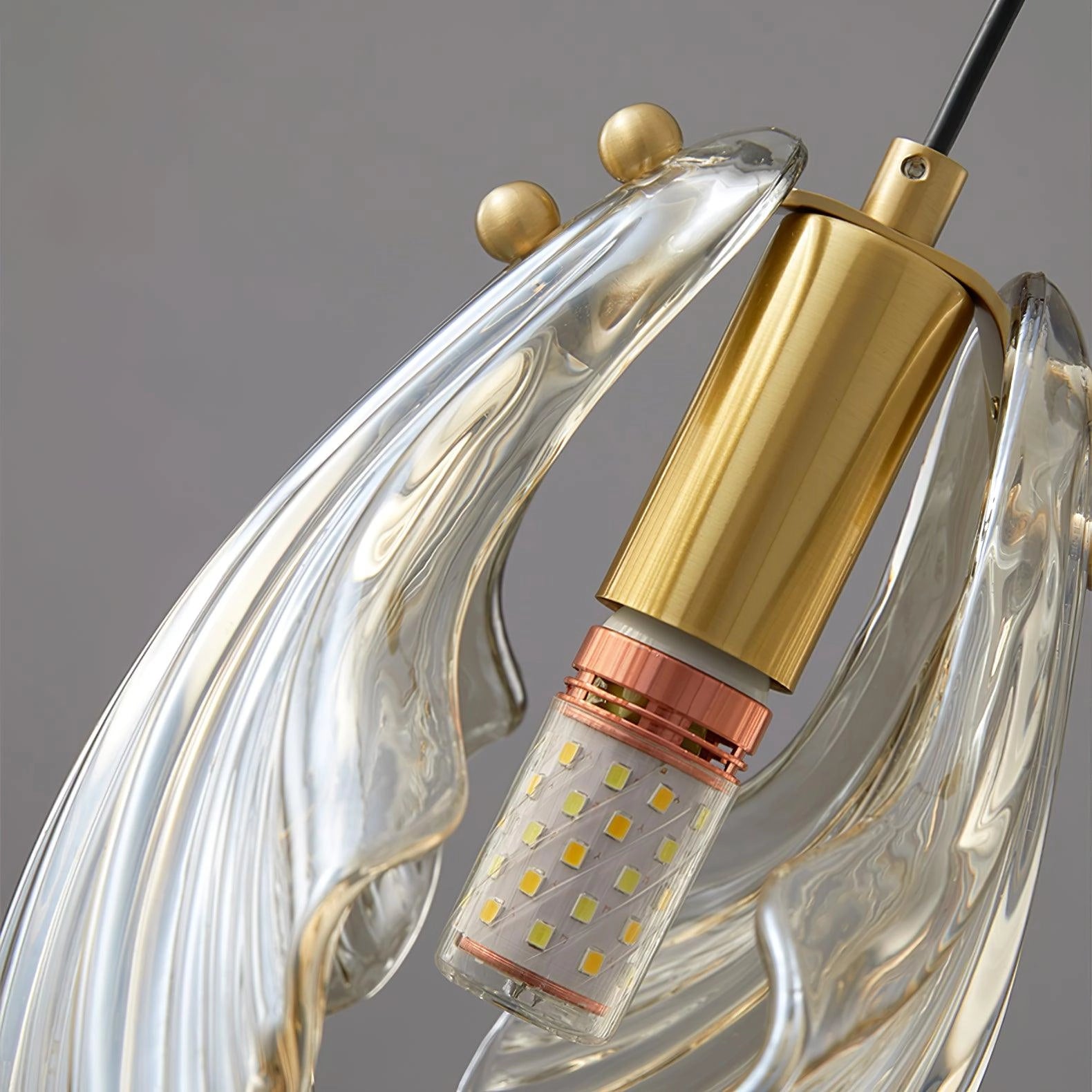 Elegant Petal Glass Pendant Light with modern LED lighting, featuring a floral chandelier design made of glass and metal.