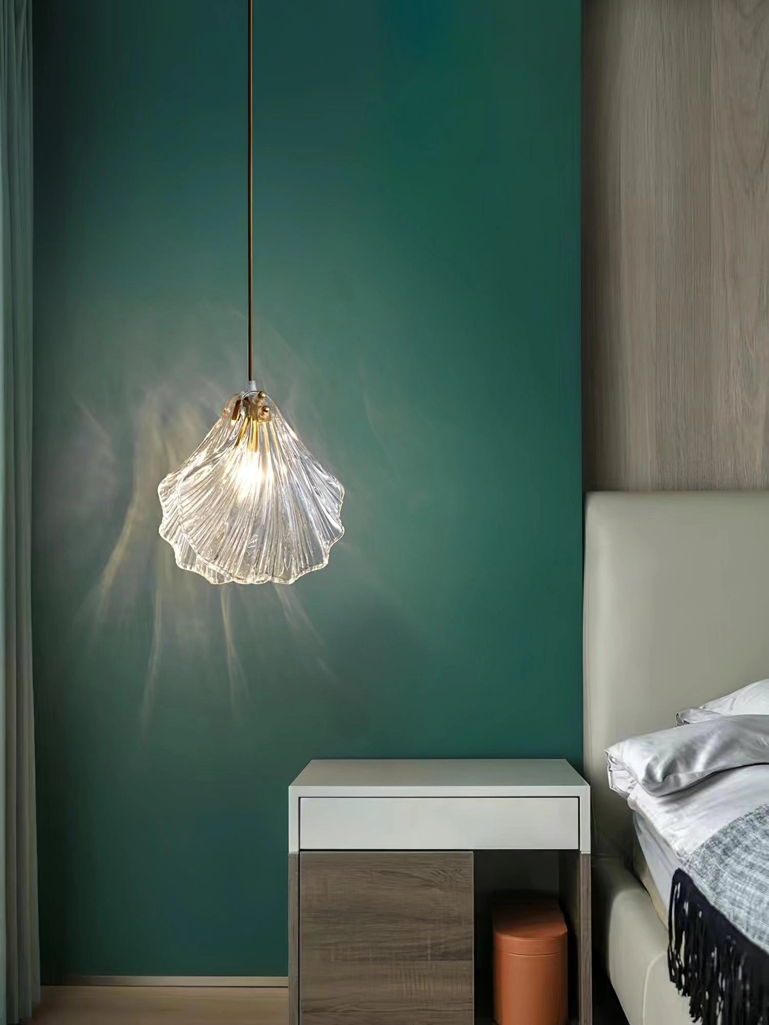 Modern LED Floral Chandelier, Elegant Petal Glass Pendant Light hanging in a stylish, grey-themed interior with wooden accents and shelving.