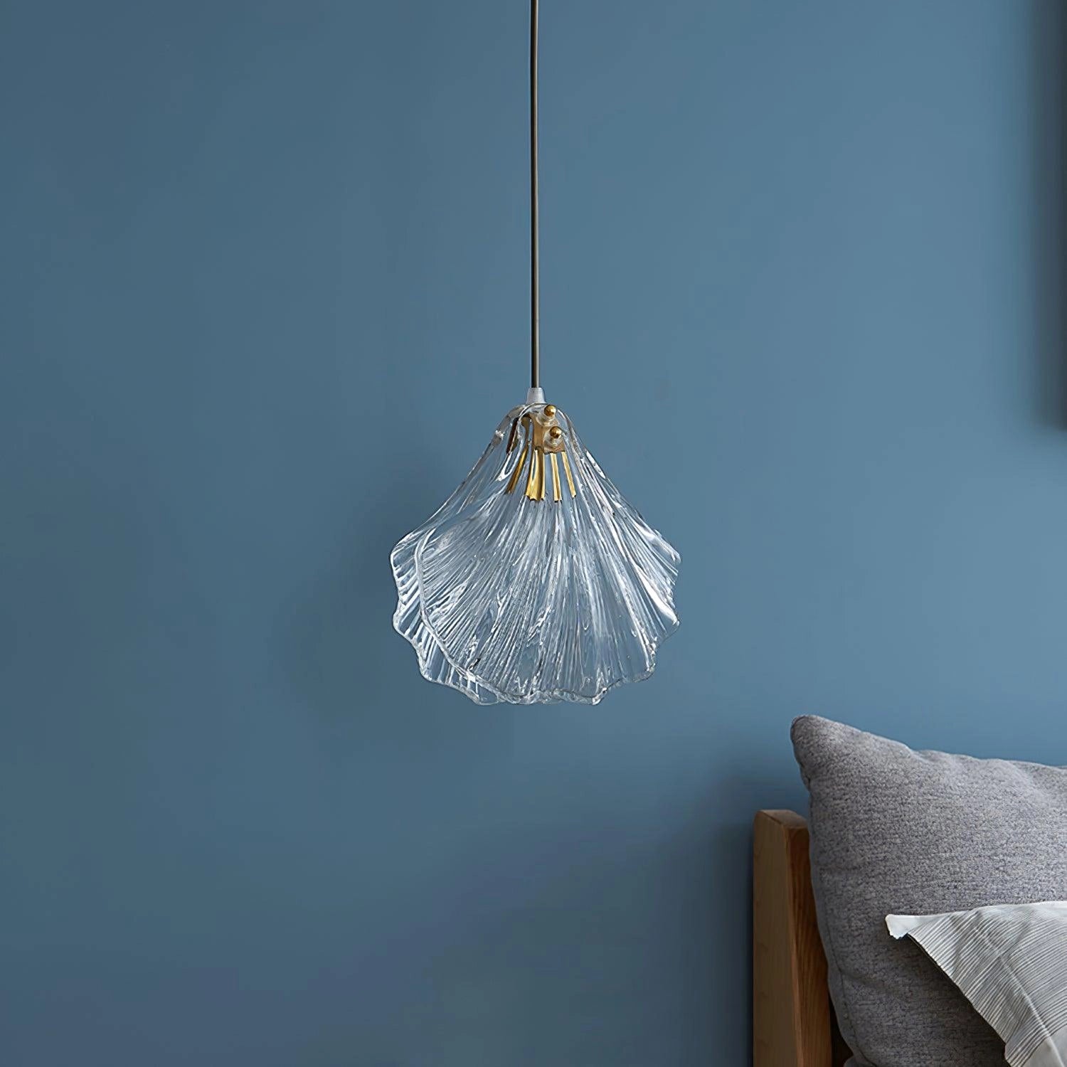 Elegant Petal Glass Pendant Light - Modern LED Floral Chandelier with transparent glass petals resembling delicate flower petals, hanging from a ceiling fixture.