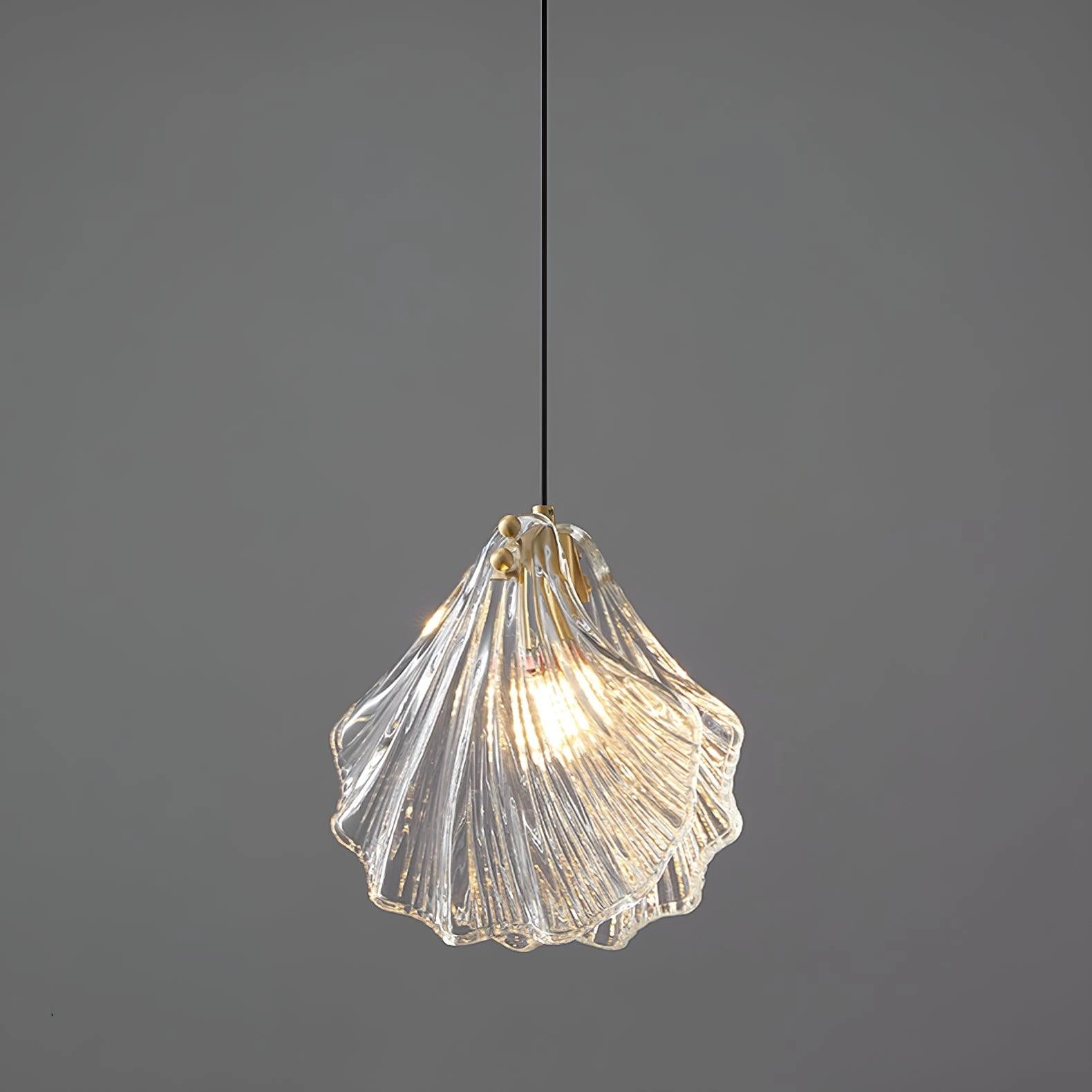 Elegant petal glass pendant light with modern LED floral chandelier design, featuring glass petals and a ceiling fixture.