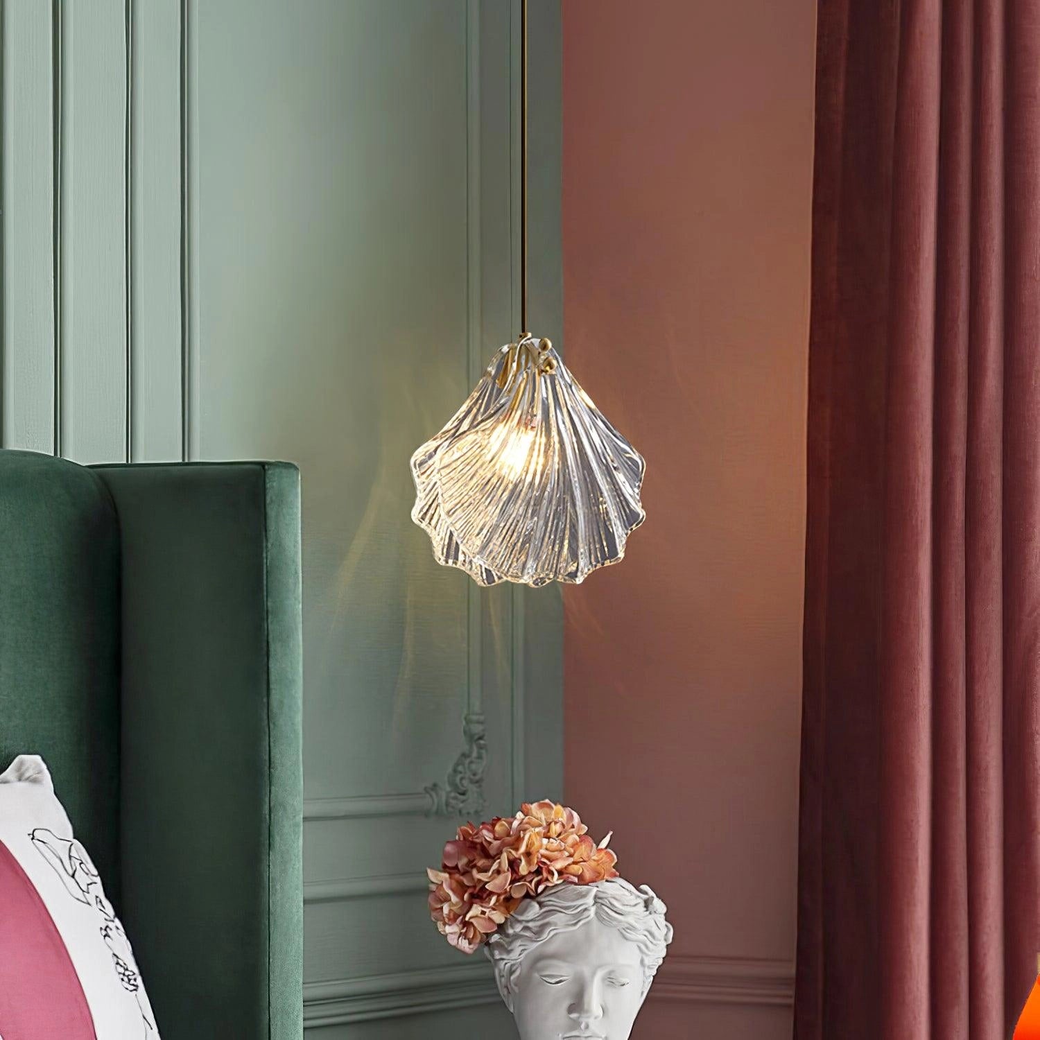 Elegant Petal Glass Pendant Light - Modern LED Floral Chandelier hanging in a stylishly designed room with wooden elements, curtains, and a large window in the background.