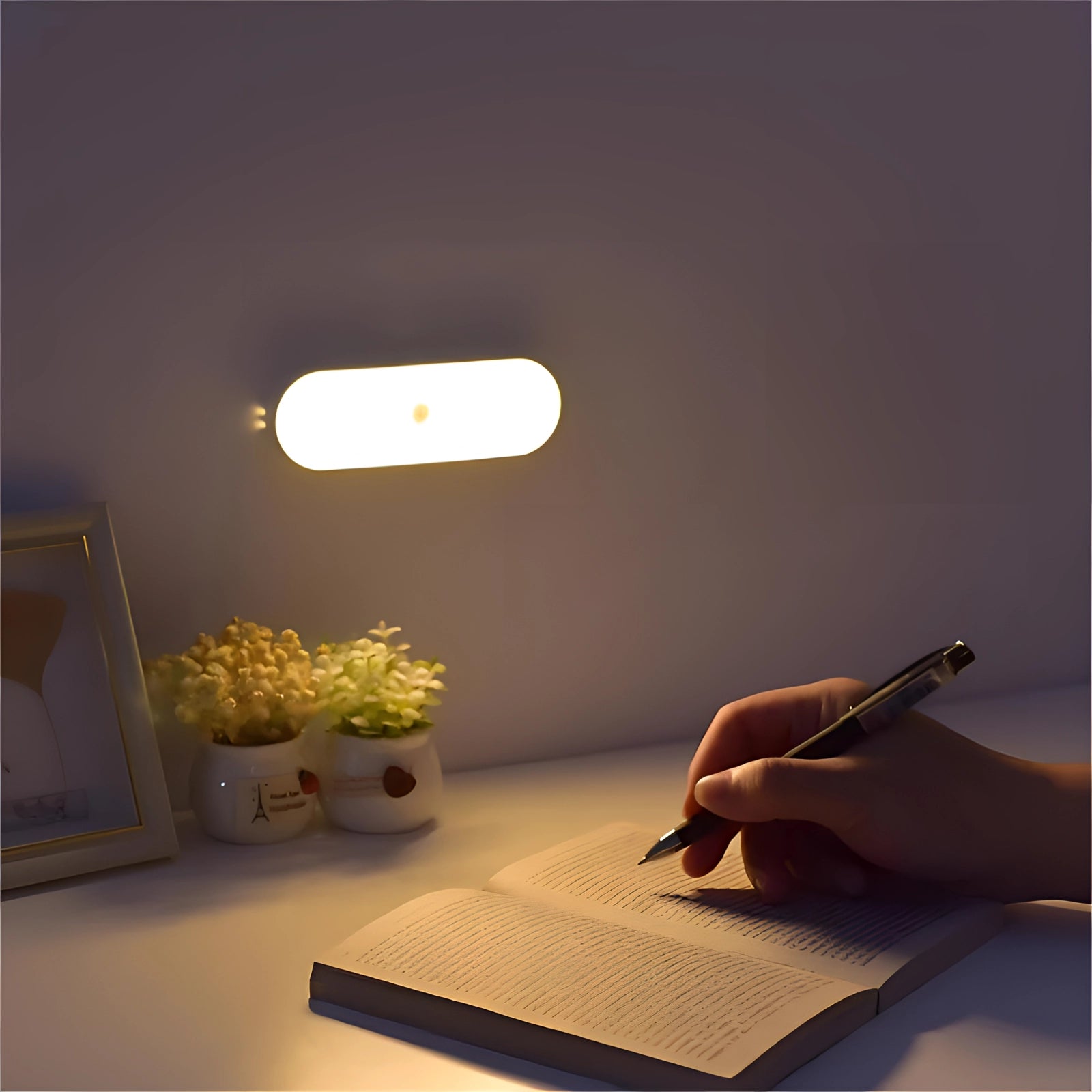 Energy-efficient adjustable LED reading light with motion sensor placed in a room with wooden flooring and houseplants, providing comfortable lighting with shades and tints.