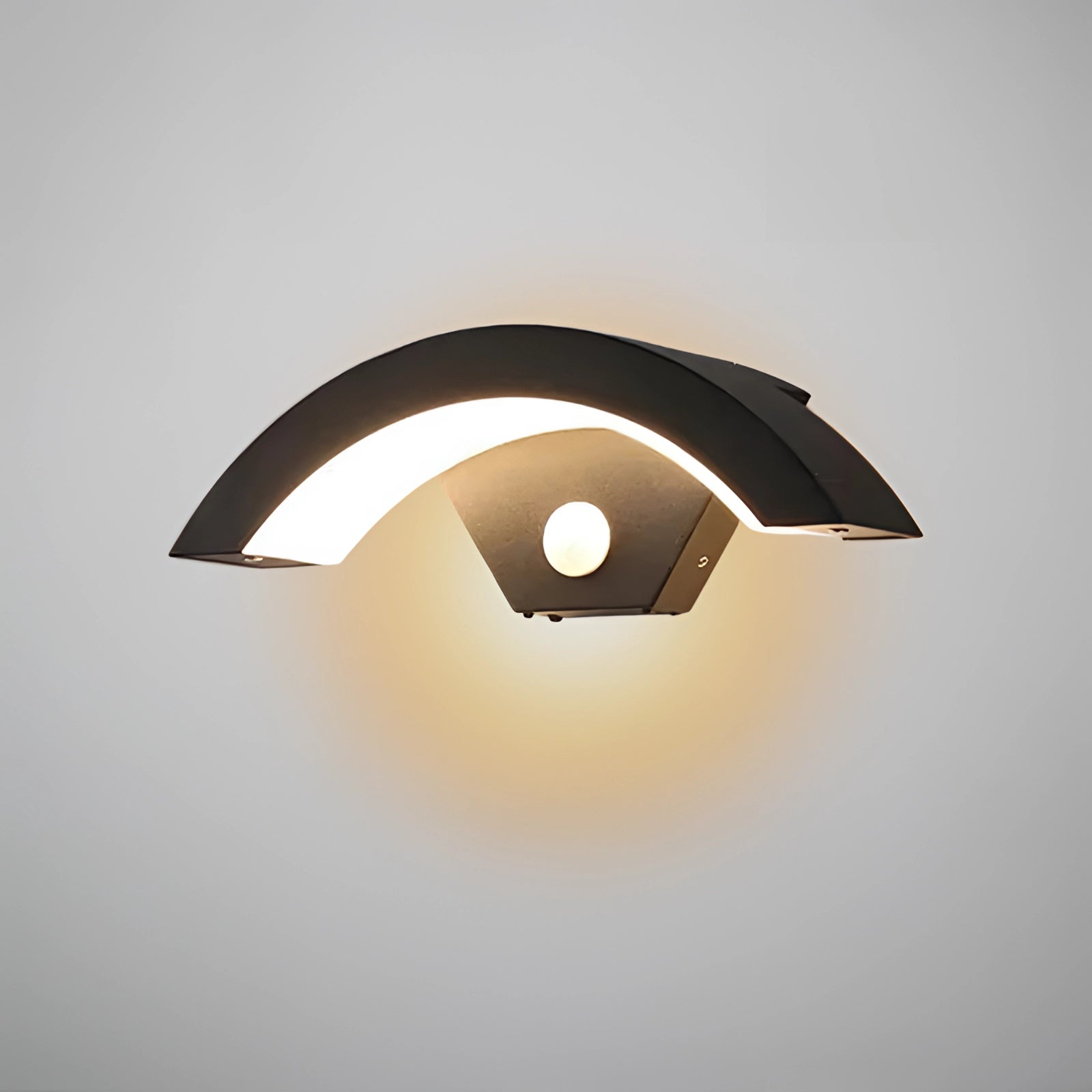 EyeGleam eye-shaped LED wall light mounted on an outdoor wall, featuring a modern design with circular elements and a stylish sconce appearance.