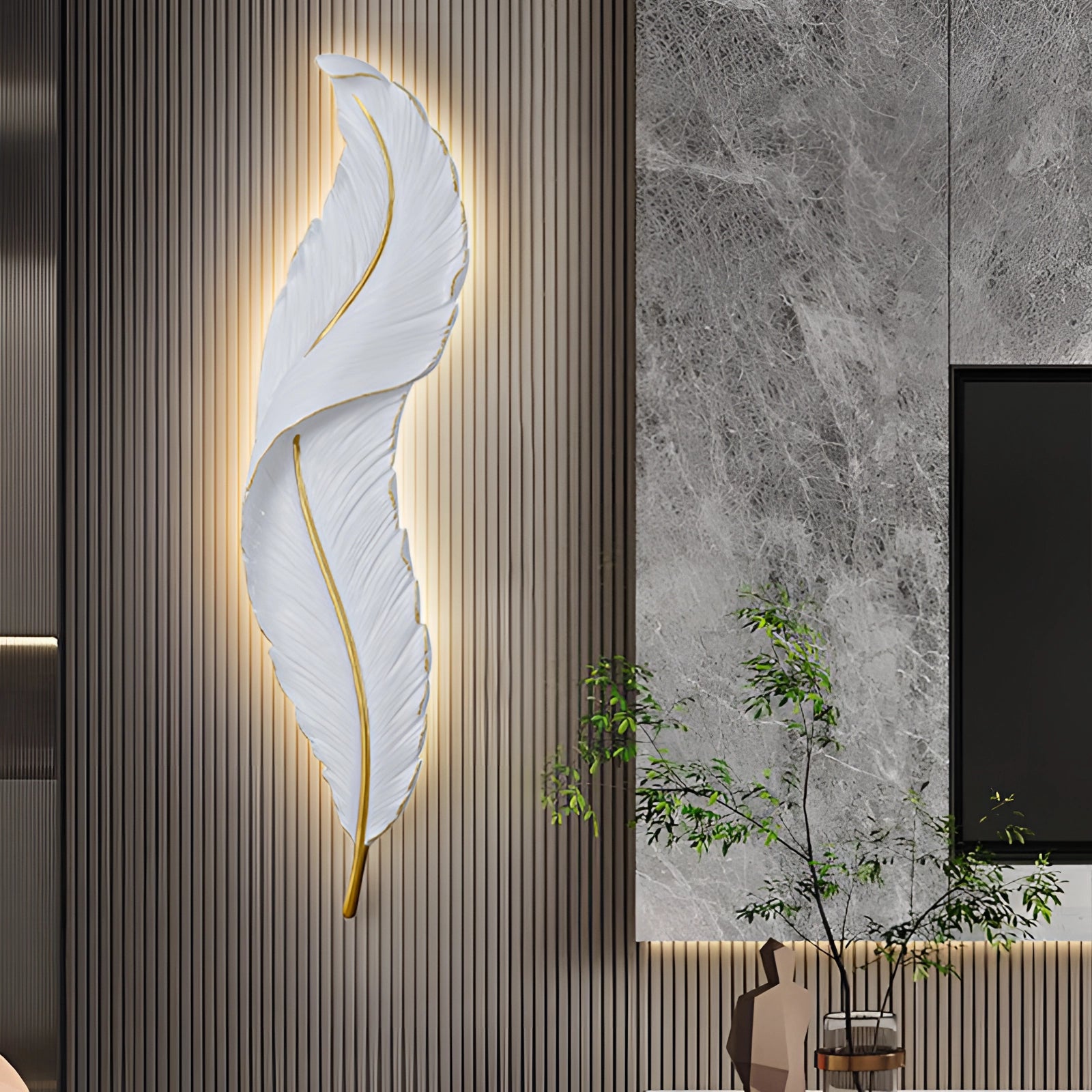 Modern, elegant Feather LED wall sconce with decorative feather design, mounted on an interior wall showcasing contemporary architecture and interior design elements.