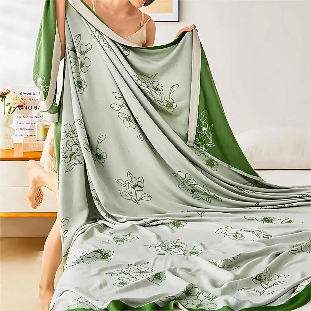 Green botanical floral bedding set with a luxury duvet and satin sheets, featuring a soft, silk-like pattern with intricate botanical designs.