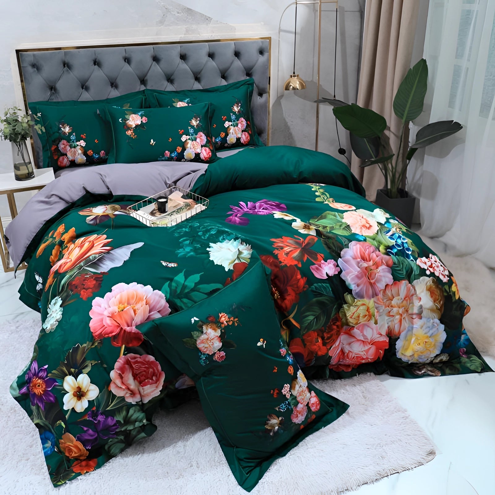 Luxurious floral bedding set featuring a vibrant botanical duvet and a colorful flower-patterned bedspread, displayed on a comfortable bed with a green and aqua theme, complemented by pillows and a sturdy bed frame.