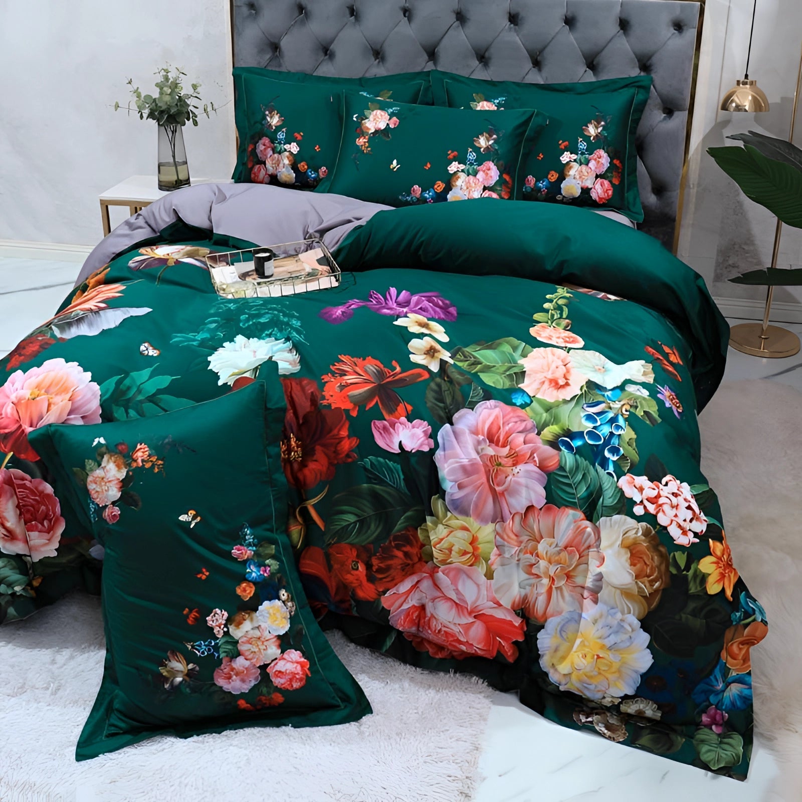 Floral bedding set featuring a luxury botanical duvet with vibrant flower patterns in shades of green, blue, and azure, complemented by matching pillows, enhancing the aesthetic of bedroom interior design.