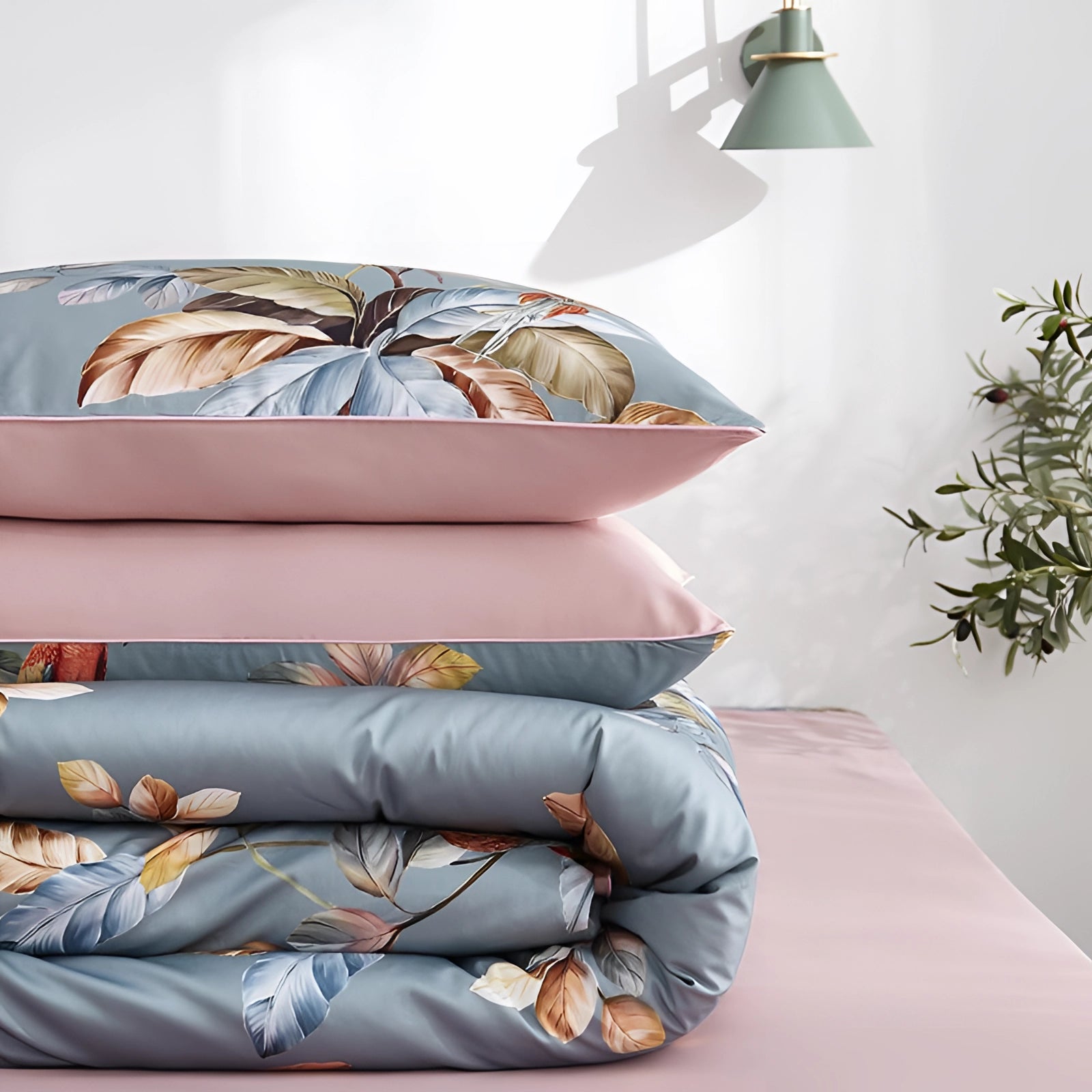 Luxurious floral botanical comforter set with a butterfly design, featuring a grey color palette. The set includes a duvet cover and matching pillow, adding a touch of comfort and elegance to the bedroom interior.