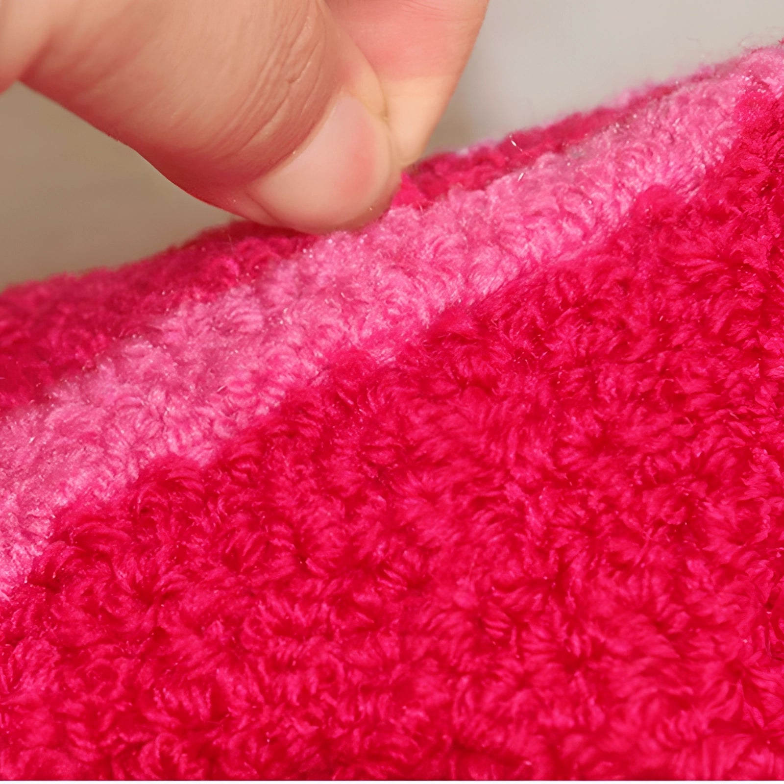 Pink floral hibiscus rug with a vibrant tropical flower pattern, featuring magenta and pink hues, adding a colorful touch to living room decor.
