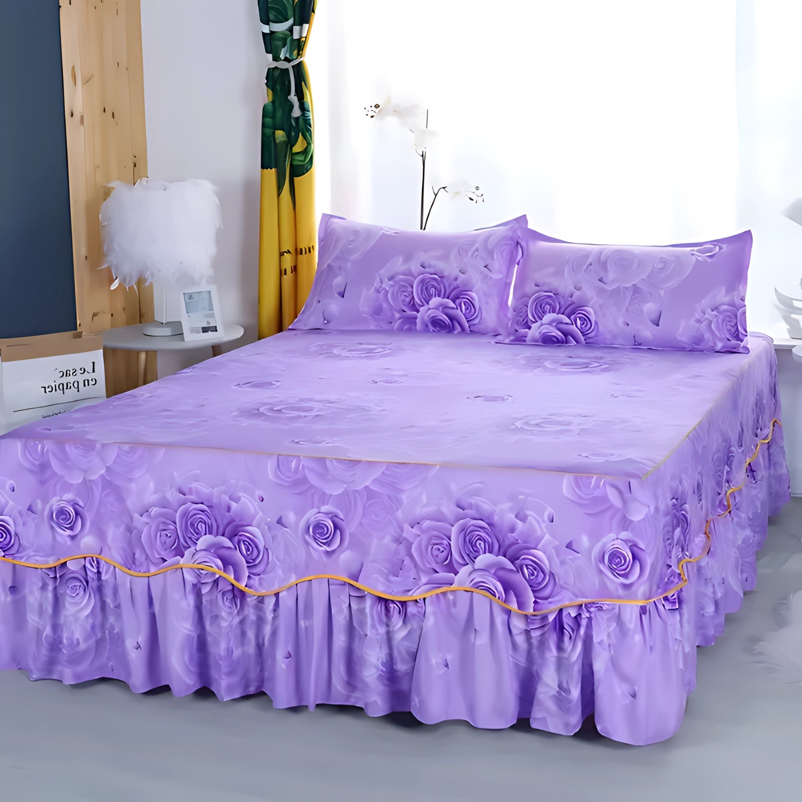 Luxurious floral ice silk bedding set in shades of purple and violet, featuring a ruffled skirt and matching pillowcases, displayed on a neatly made bed in a well-decorated bedroom interior.