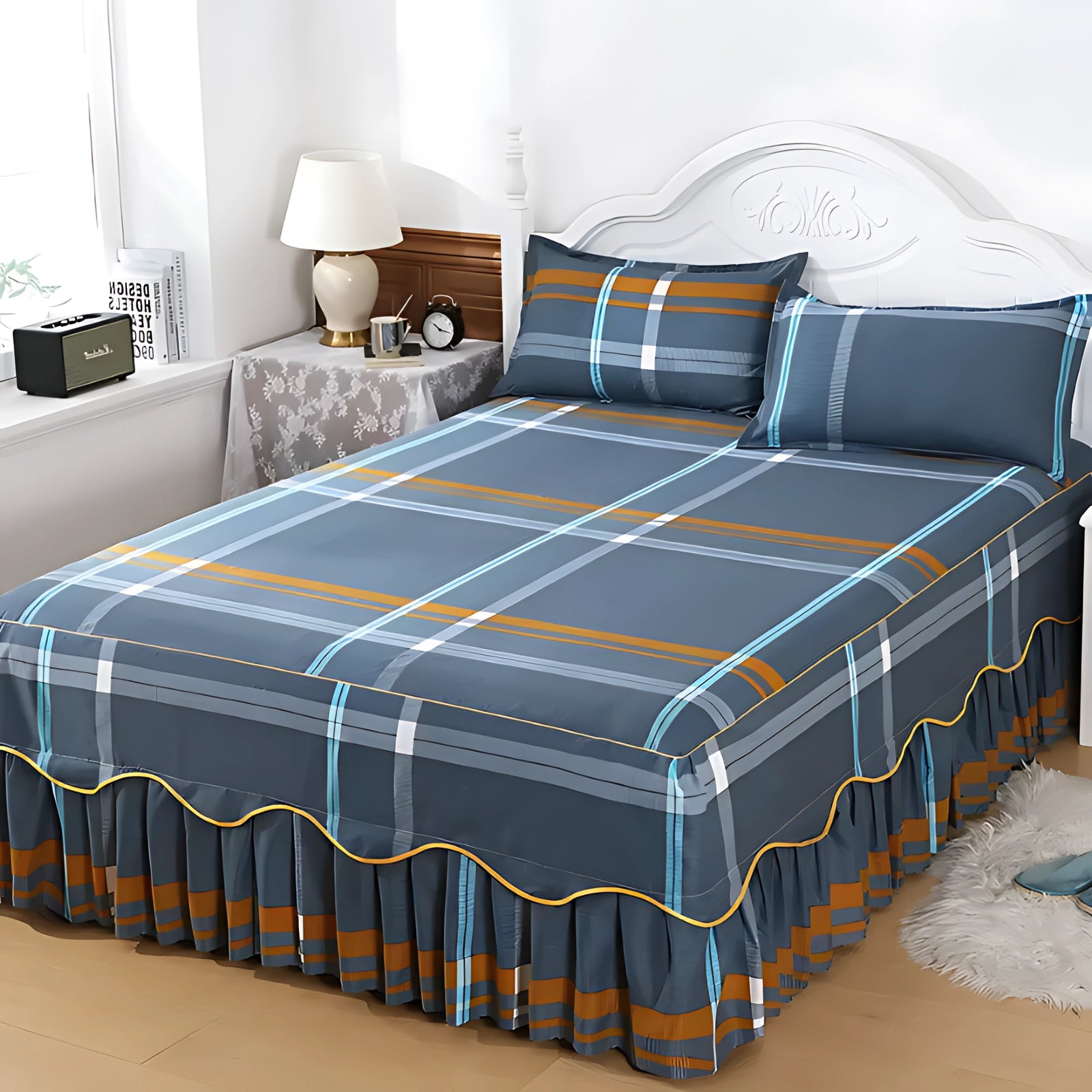 Luxurious floral ice silk bedding set with ruffled skirt and pillowcase, displayed on a bed with a wooden frame. The set is designed for a bed size of 200x220cm and is set in a room with neutral grey tones, showcasing comfort and elegance.