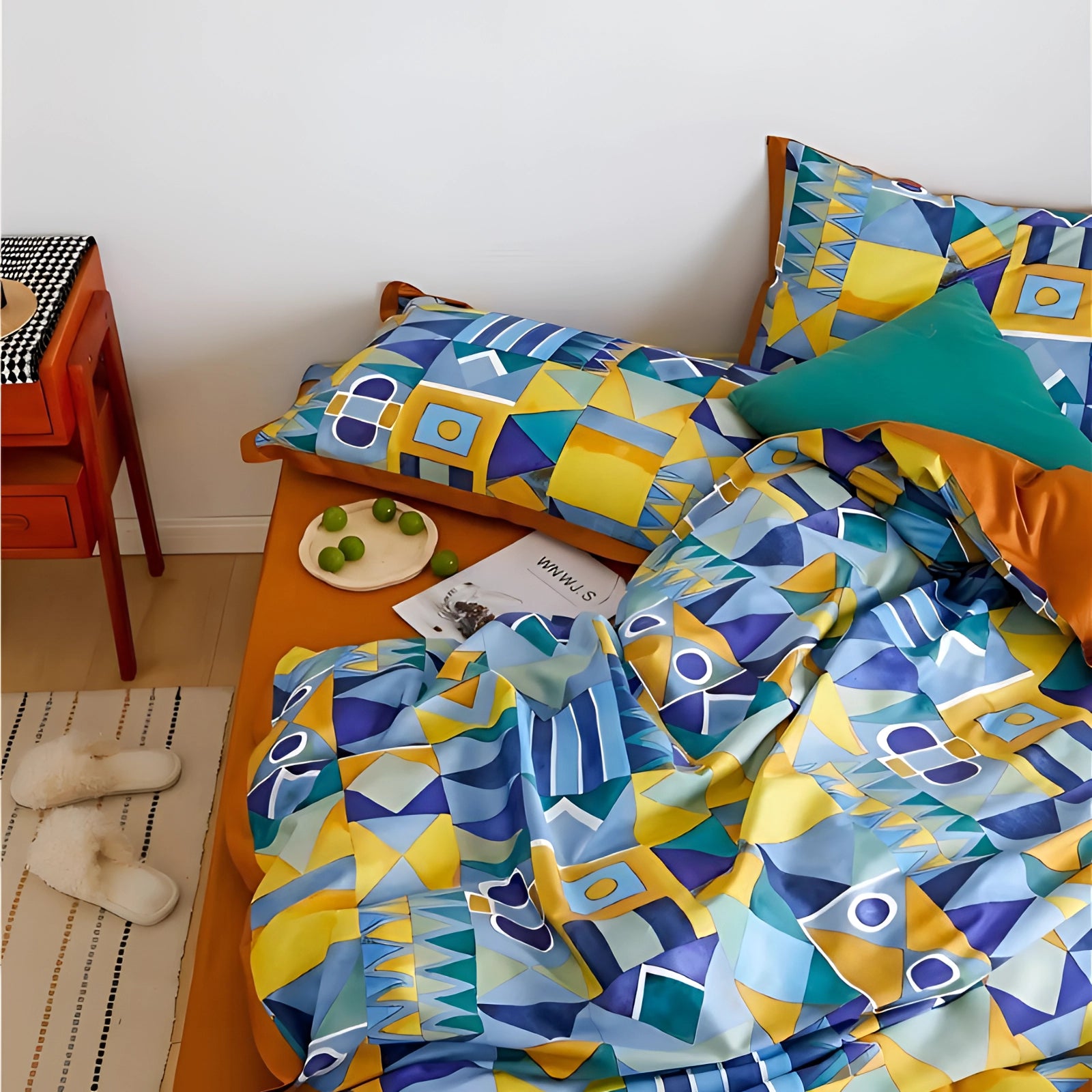 Modern geometric pattern duvet cover in electric blue, made of Egyptian cotton, displayed in a contemporary bedroom setting with matching pillowcases.
