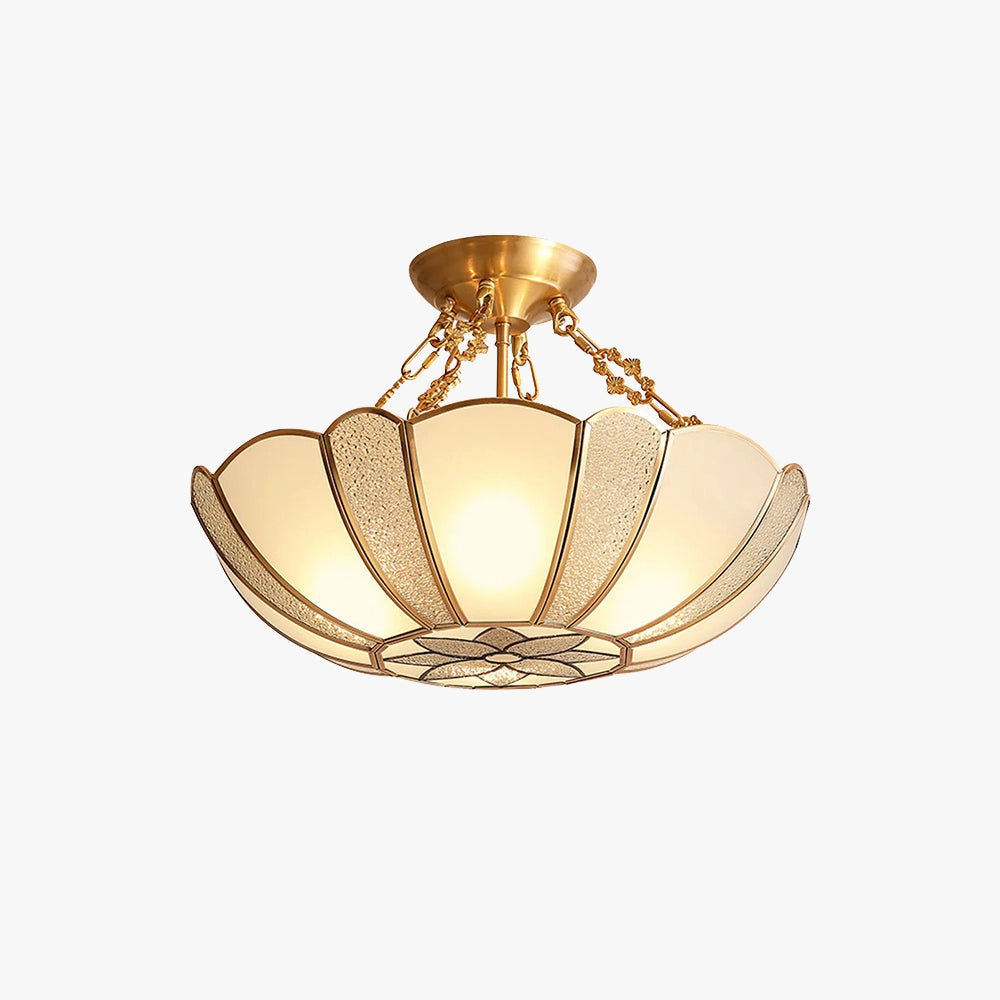 Gold Art Deco semi-flush ceiling light featuring a frosted glass shade, designed with symmetrical metal details and a circular form, providing an elegant and vintage-inspired illumination.