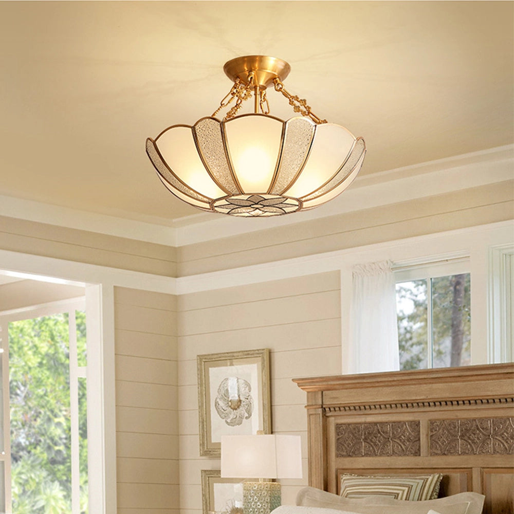 Gold Art Deco semi-flush ceiling light with frosted glass, featuring a diameter of 17.7 inches, installed in an elegantly designed interior with wooden elements and natural light filtering through a window.