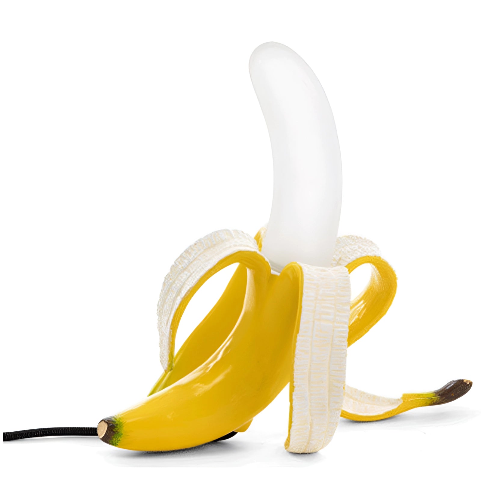 Gold banana-shaped resin table lamp with a yellow stand, featuring a modern art fruit sculpture design that resembles a peeled banana, blending contemporary art and functional decor.