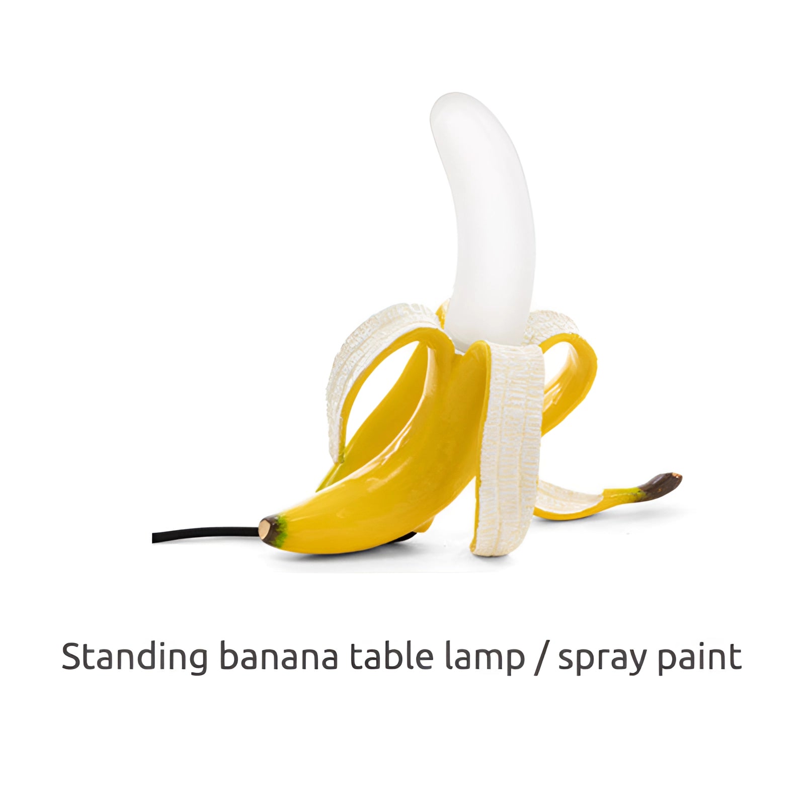 Gold banana-shaped resin table lamp, modern art fruit sculpture decor featuring a stylized banana design.