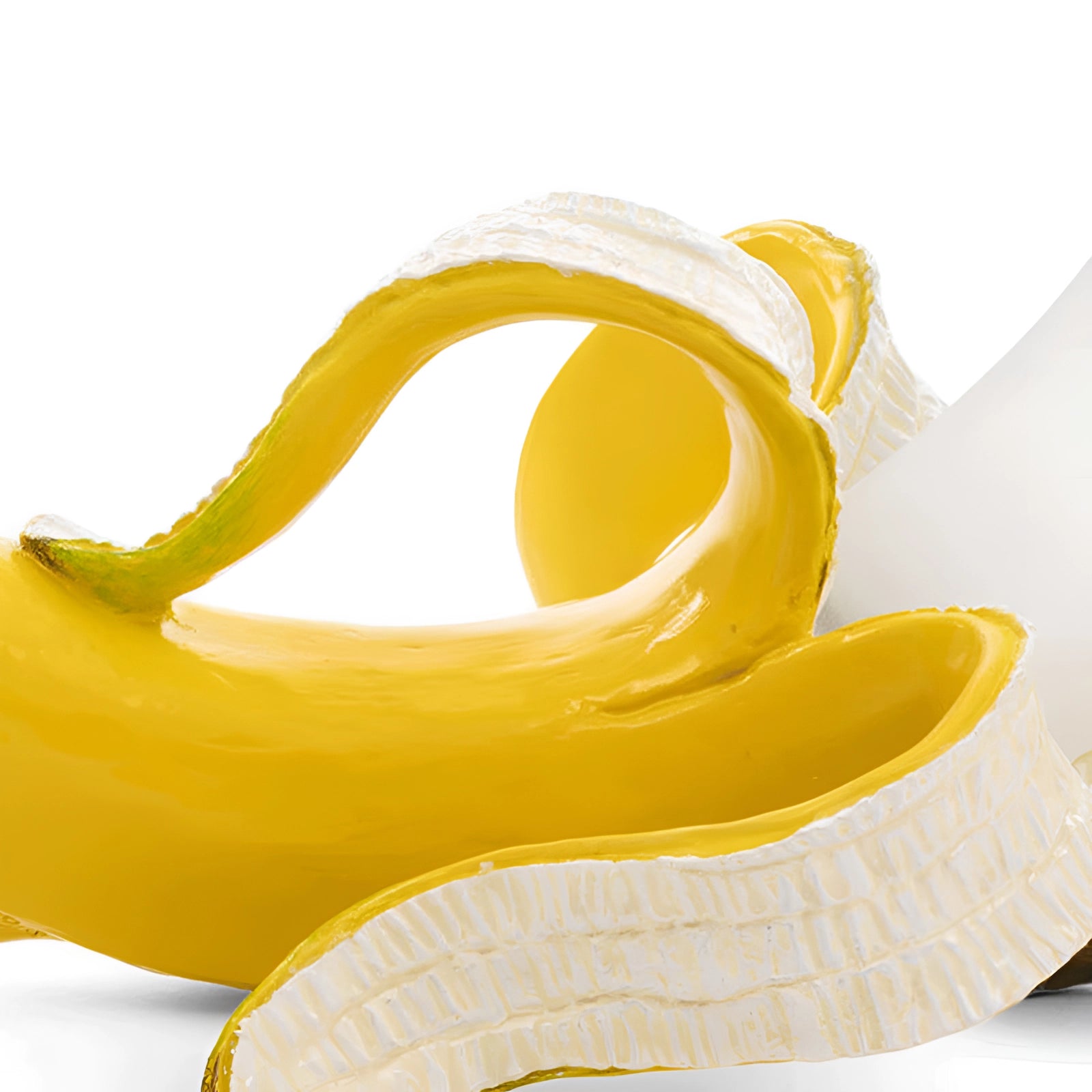Gold banana-shaped resin table lamp designed as a modern art fruit sculpture decor piece, featuring realistic banana details with a glossy finish, serving as a unique and stylish home accessory.