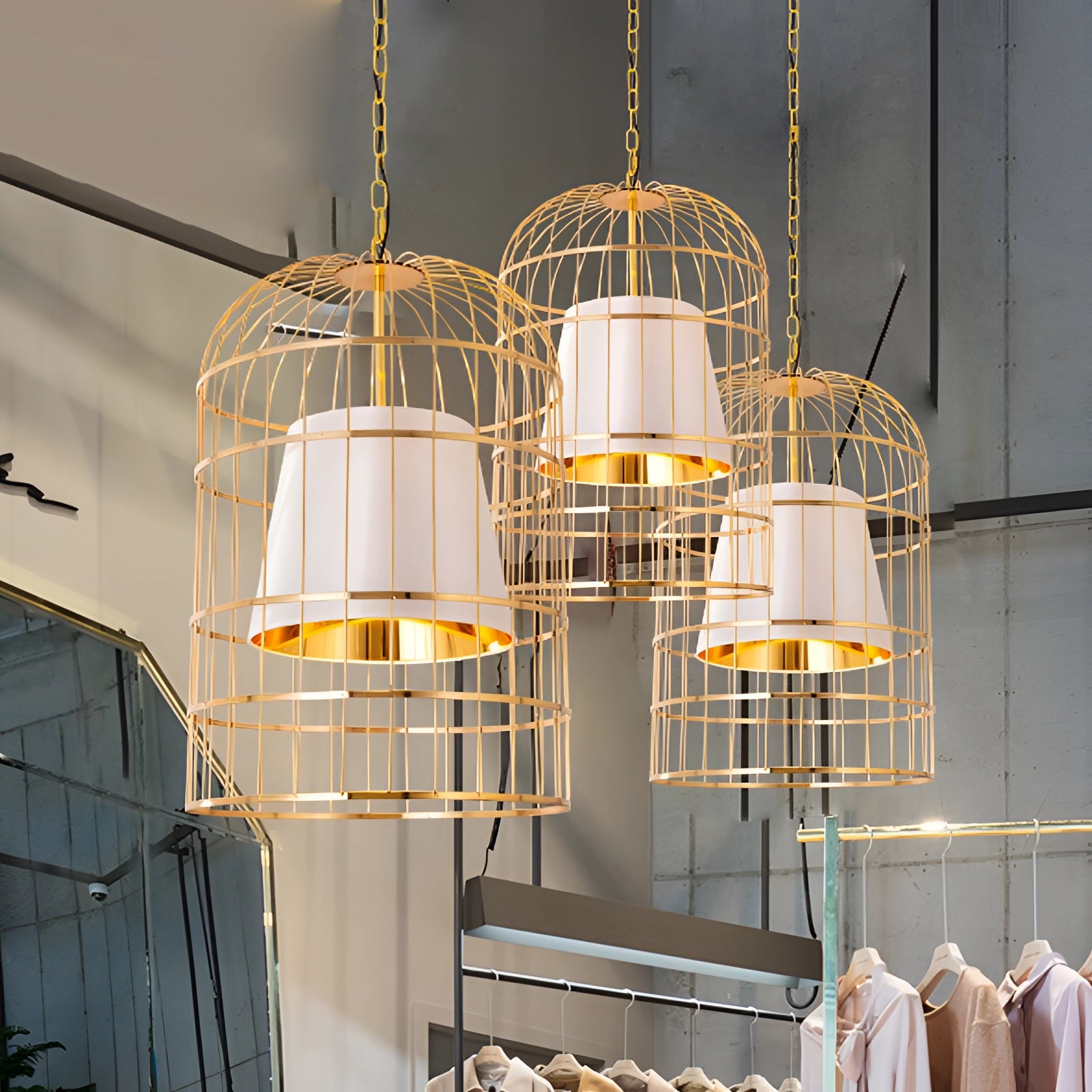 White gold birdcage chandelier with modern design, featuring an 18.1-inch pendant light, elegantly hanging from the ceiling.