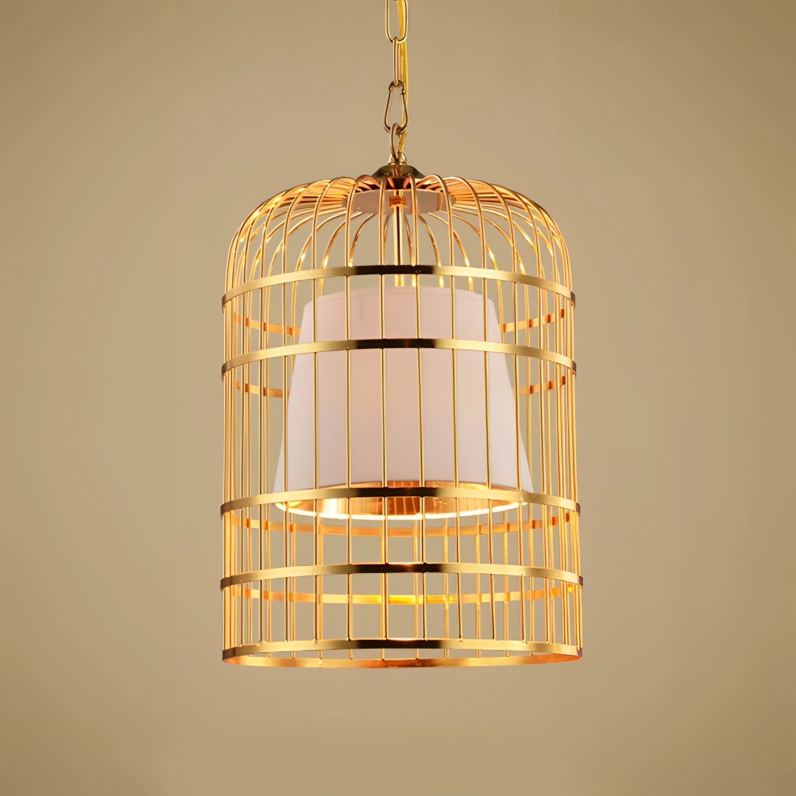 Gold birdcage chandelier hanging from the ceiling, designed as a modern pendant light with intricate metalwork, resembling an artistic ornament ideal for a dining room setting.