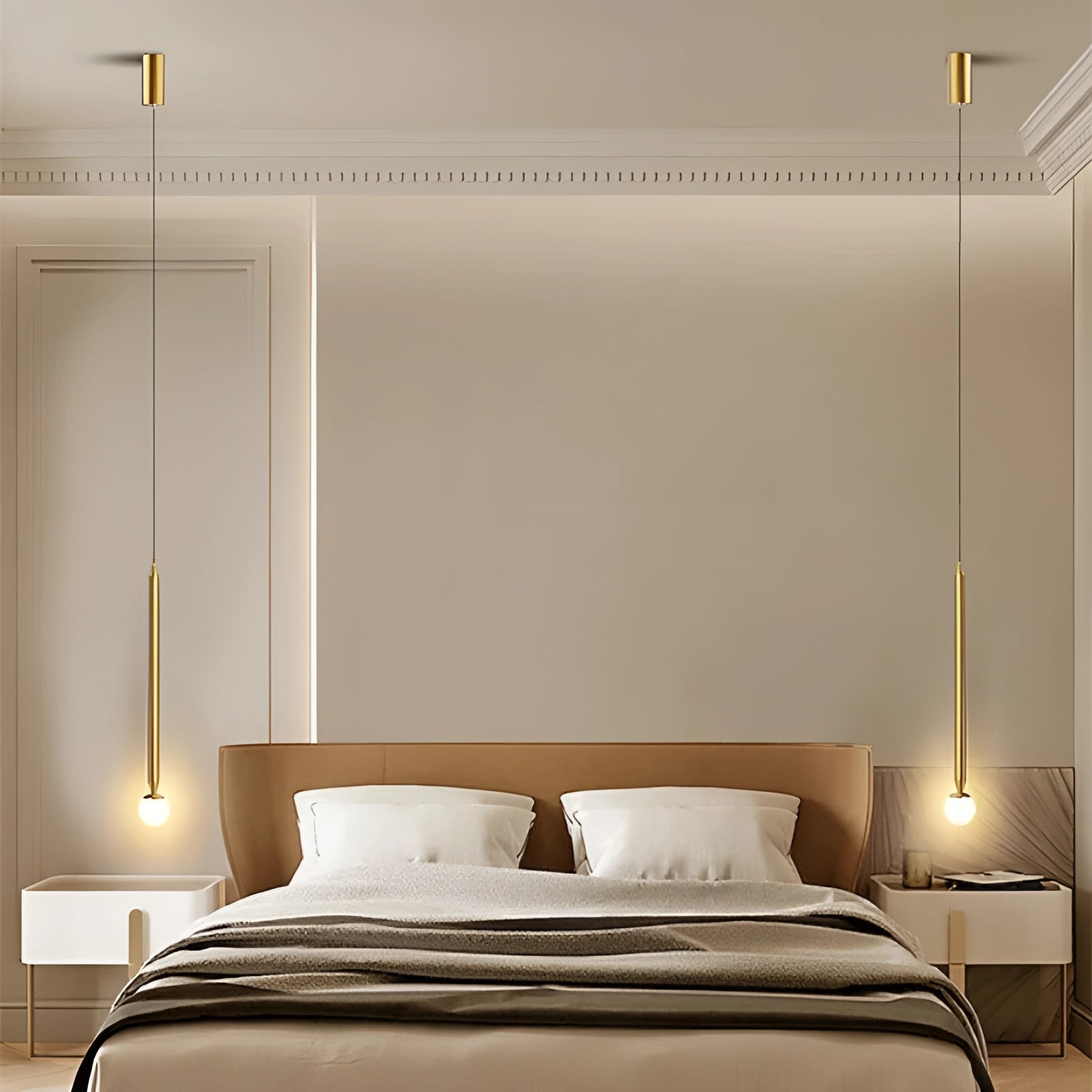 Gold and black modern vertical pendant light with elegant design, featuring a 3 color change option, suspended from the ceiling in a contemporary interior setting.